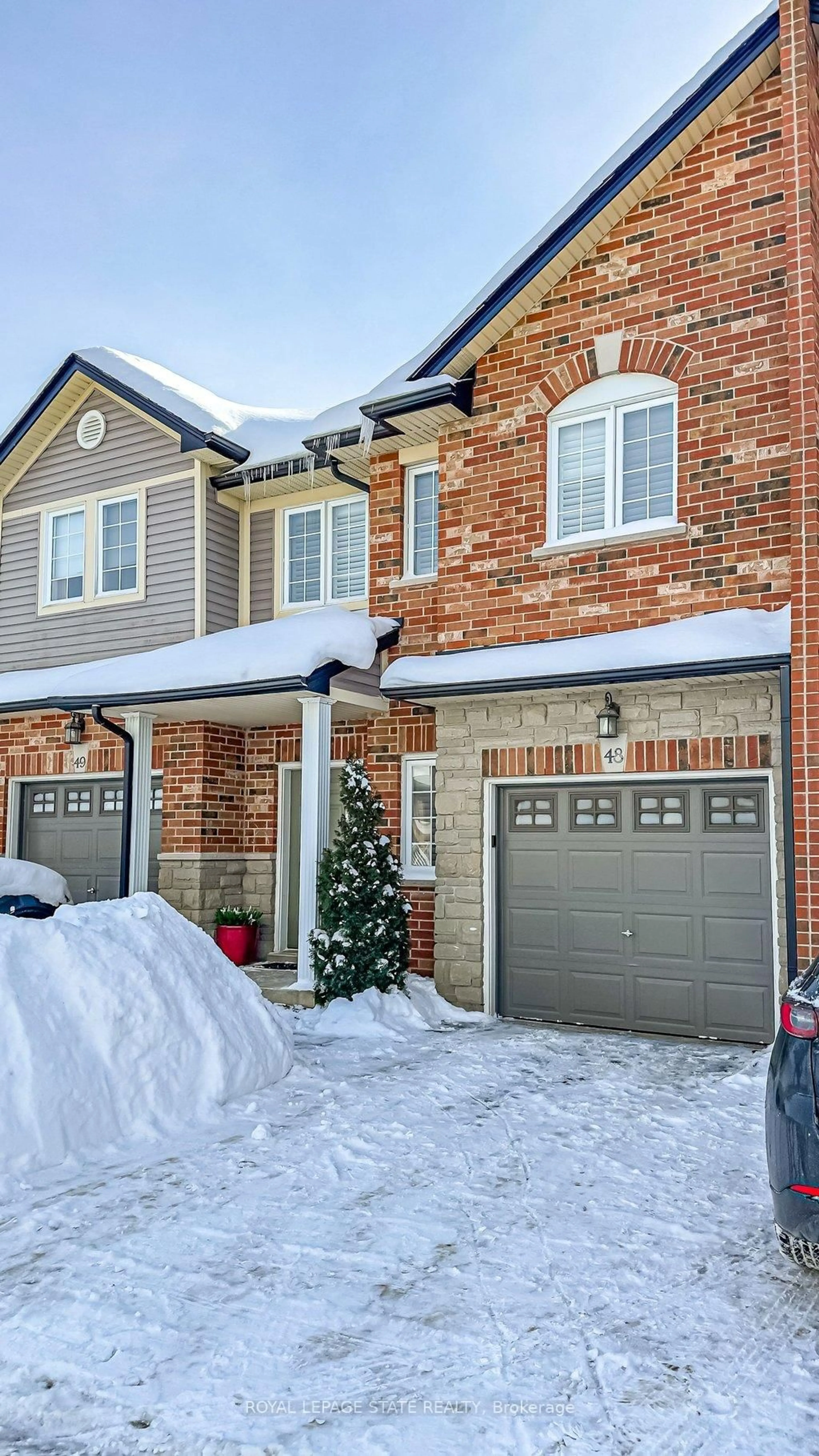 Home with brick exterior material, street for 60 Cloverleaf Dr #48, Hamilton Ontario L9K 1S8