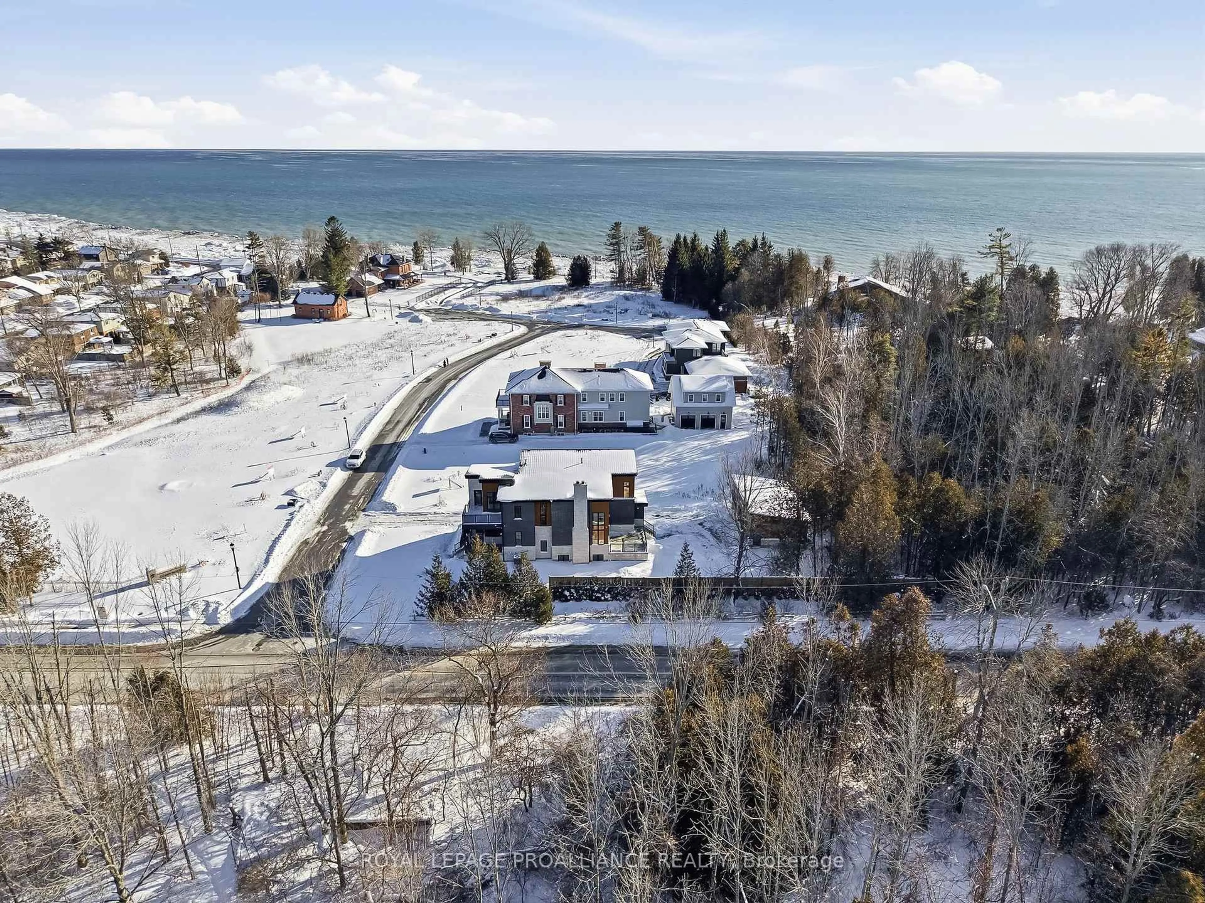 A pic from outside/outdoor area/front of a property/back of a property/a pic from drone, water/lake/river/ocean view for 213 Suzanne Mess Blvd, Cobourg Ontario K9A 3L3