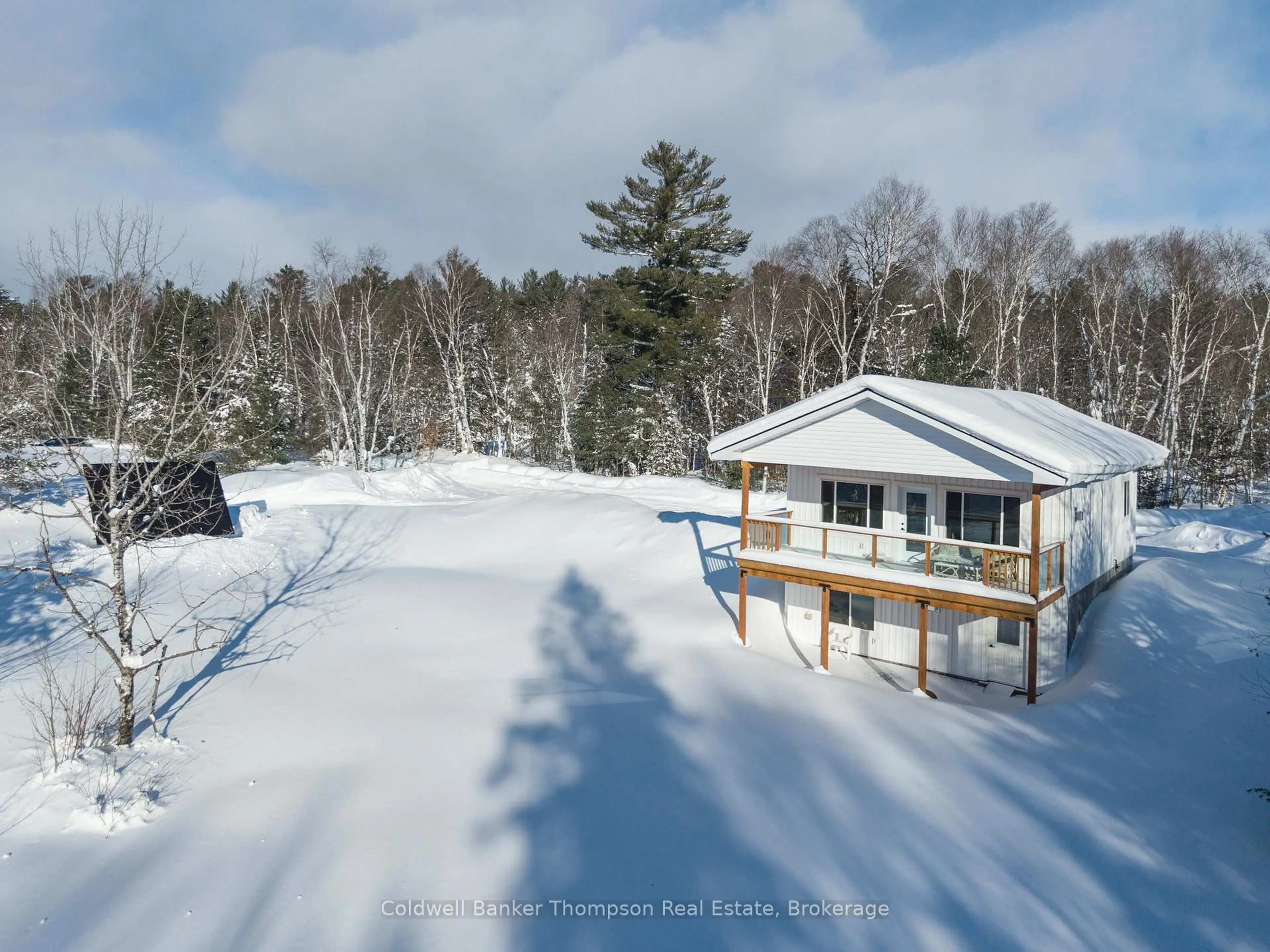 A pic from outside/outdoor area/front of a property/back of a property/a pic from drone, water/lake/river/ocean view for 255 Eighth Ave, McMurrich/Monteith Ontario P0A 1Y0