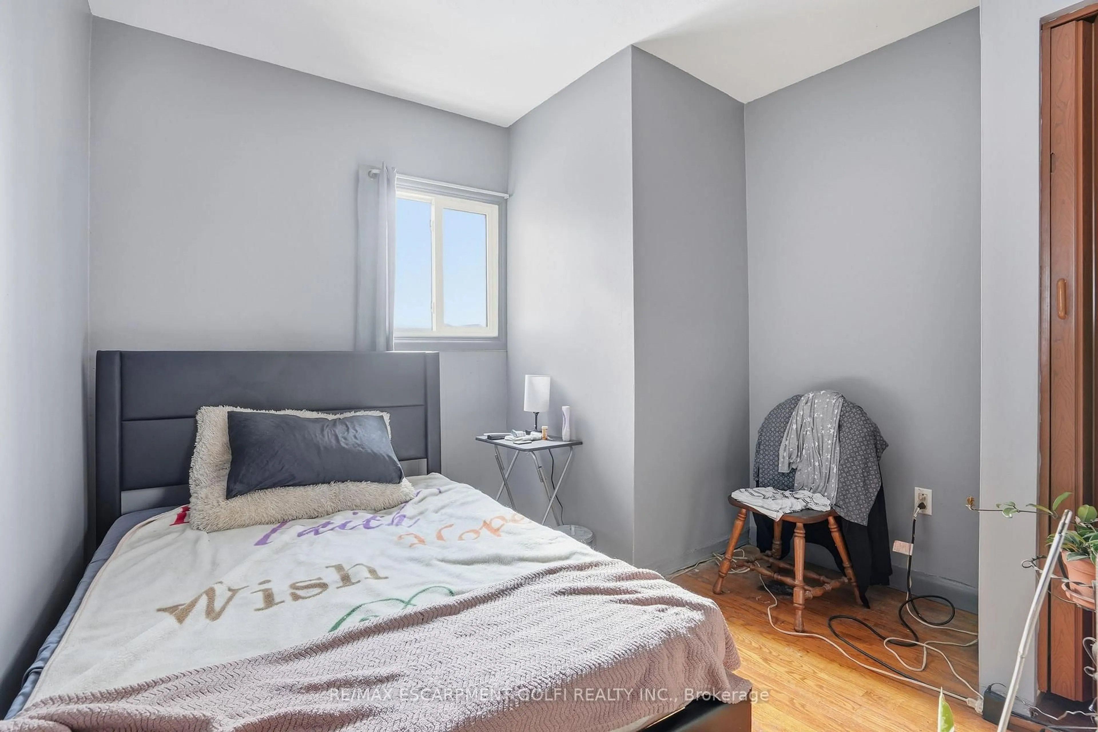 Bedroom with bed, unknown for 121 Gibson Ave, Hamilton Ontario L8L 6J9