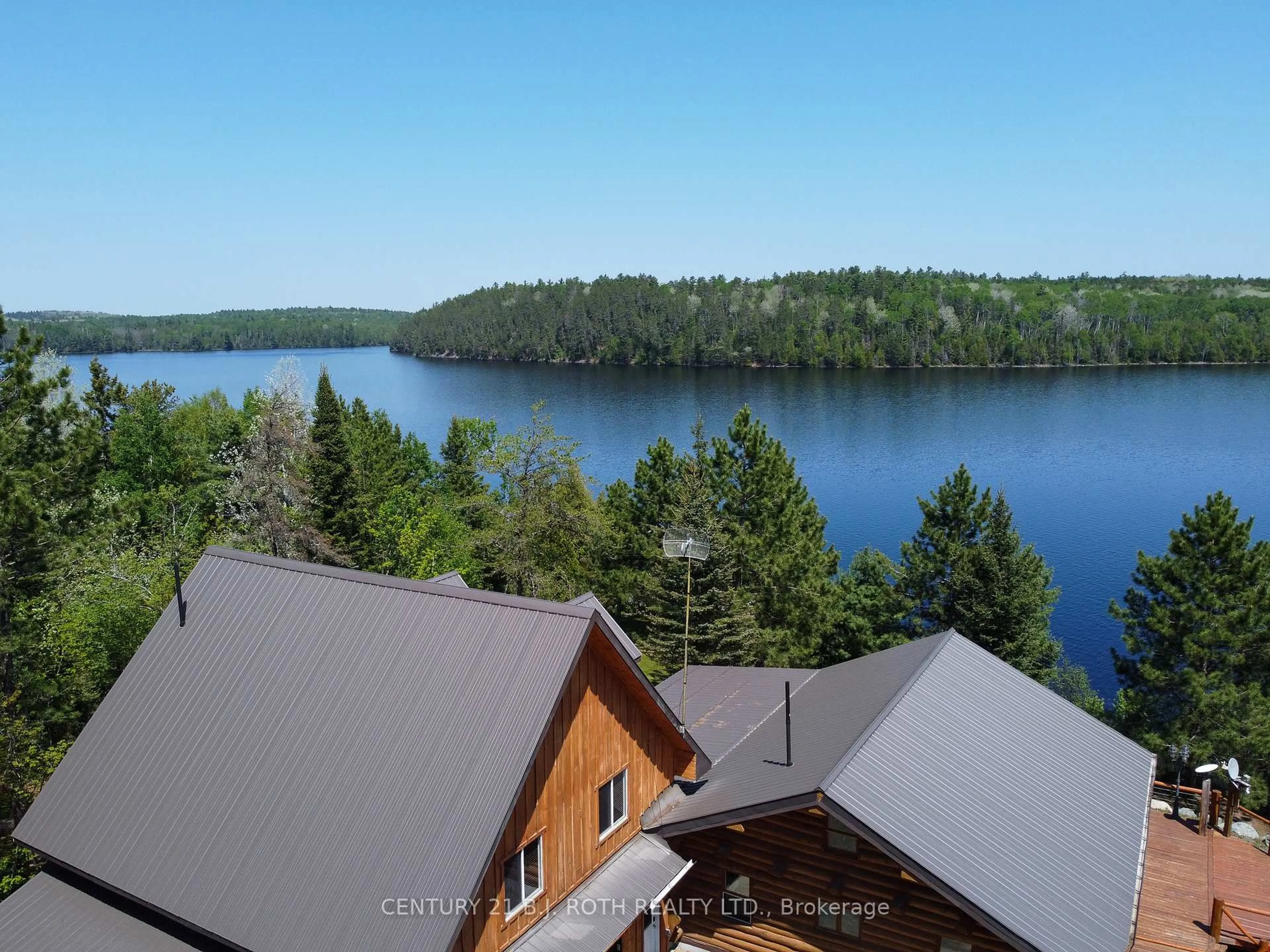 A pic from outside/outdoor area/front of a property/back of a property/a pic from drone, water/lake/river/ocean view for 59 White Bear Crt, Temagami Ontario P0H 2H0