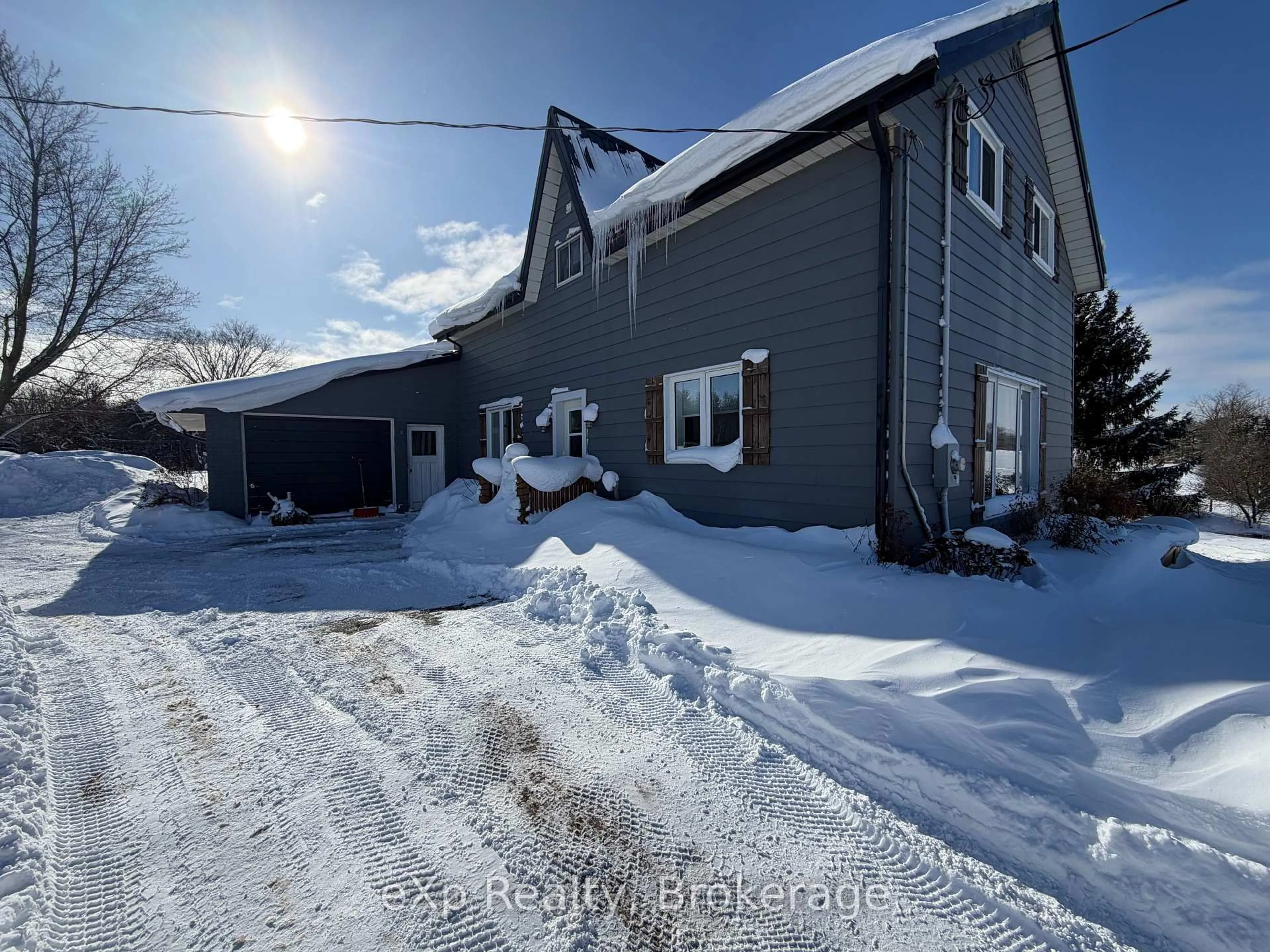A pic from outside/outdoor area/front of a property/back of a property/a pic from drone, street for 935 Concession 10 Rd, South Bruce Ontario N0G 2J0