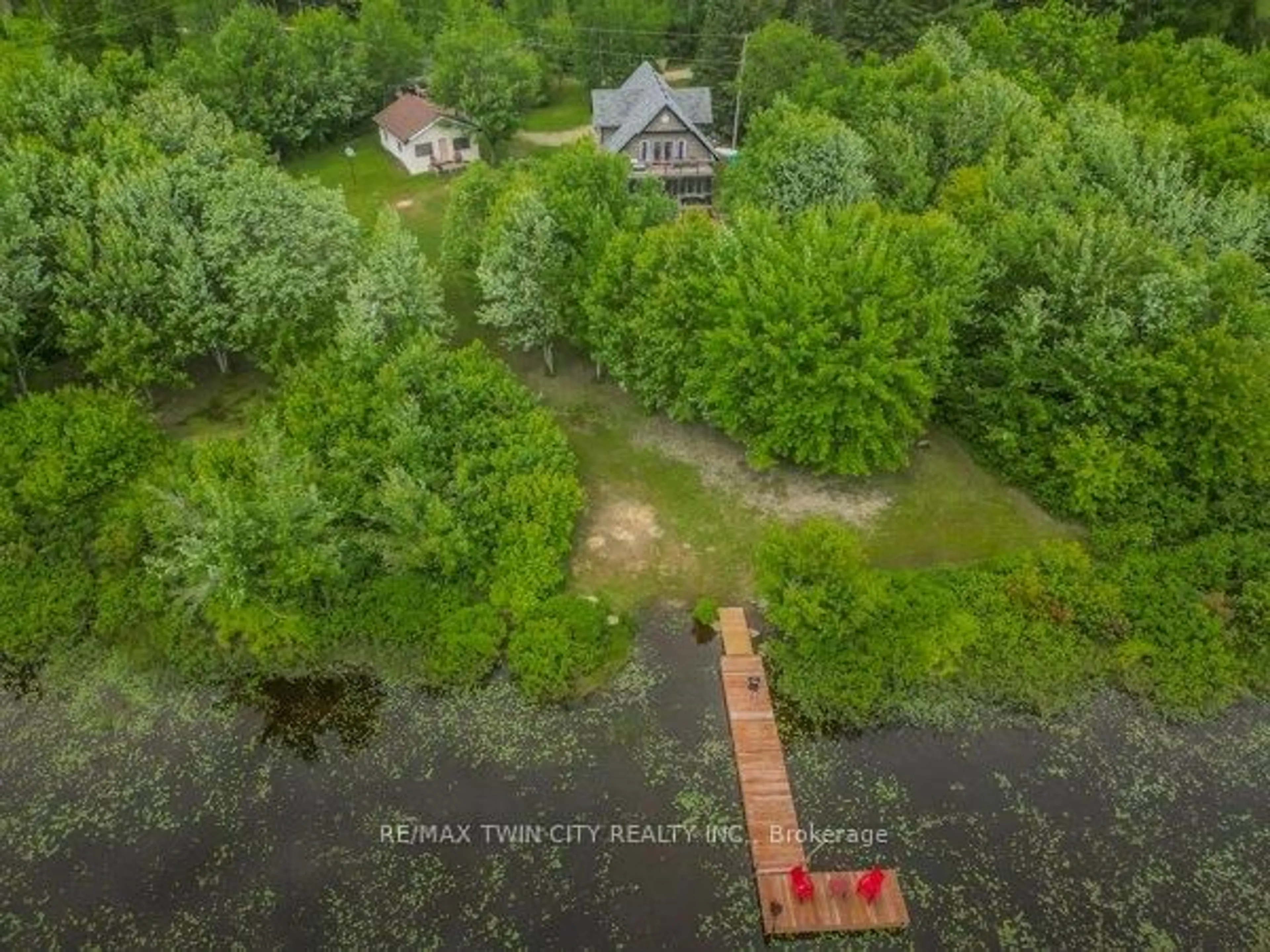 A pic from outside/outdoor area/front of a property/back of a property/a pic from drone, water/lake/river/ocean view for 5 Bridge Rd, Magnetawan Ontario P0A 1P0