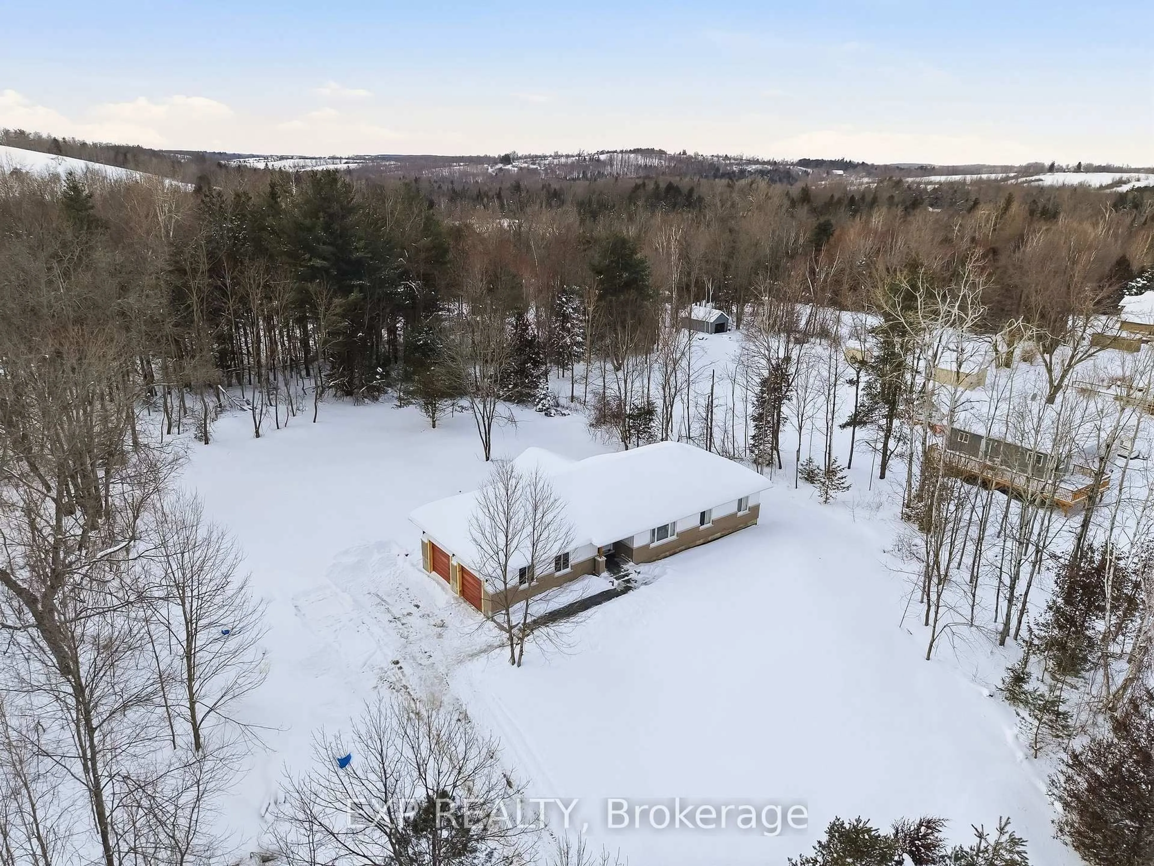A pic from outside/outdoor area/front of a property/back of a property/a pic from drone, forest/trees view for 40 Hutchinson Crt, Trent Hills Ontario K0K 3K0