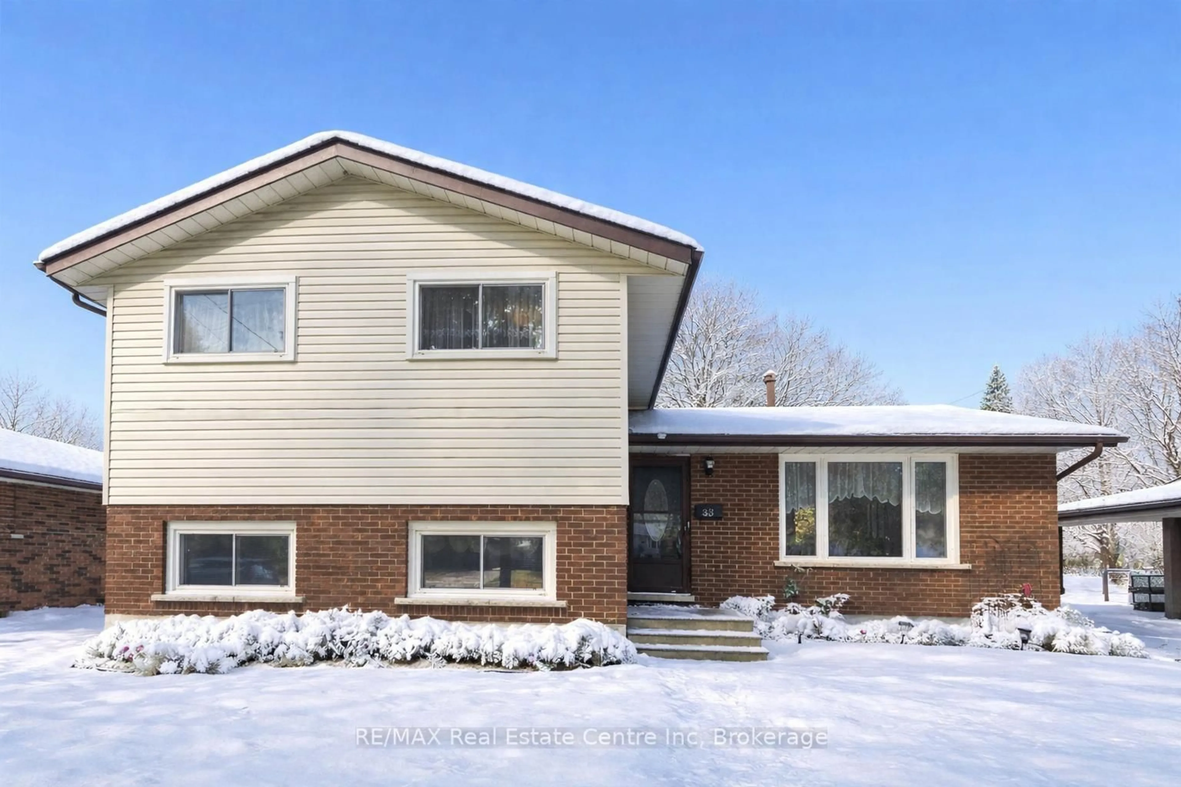 Home with brick exterior material, street for 33 Hastings Blvd, Guelph Ontario N1E 4G3