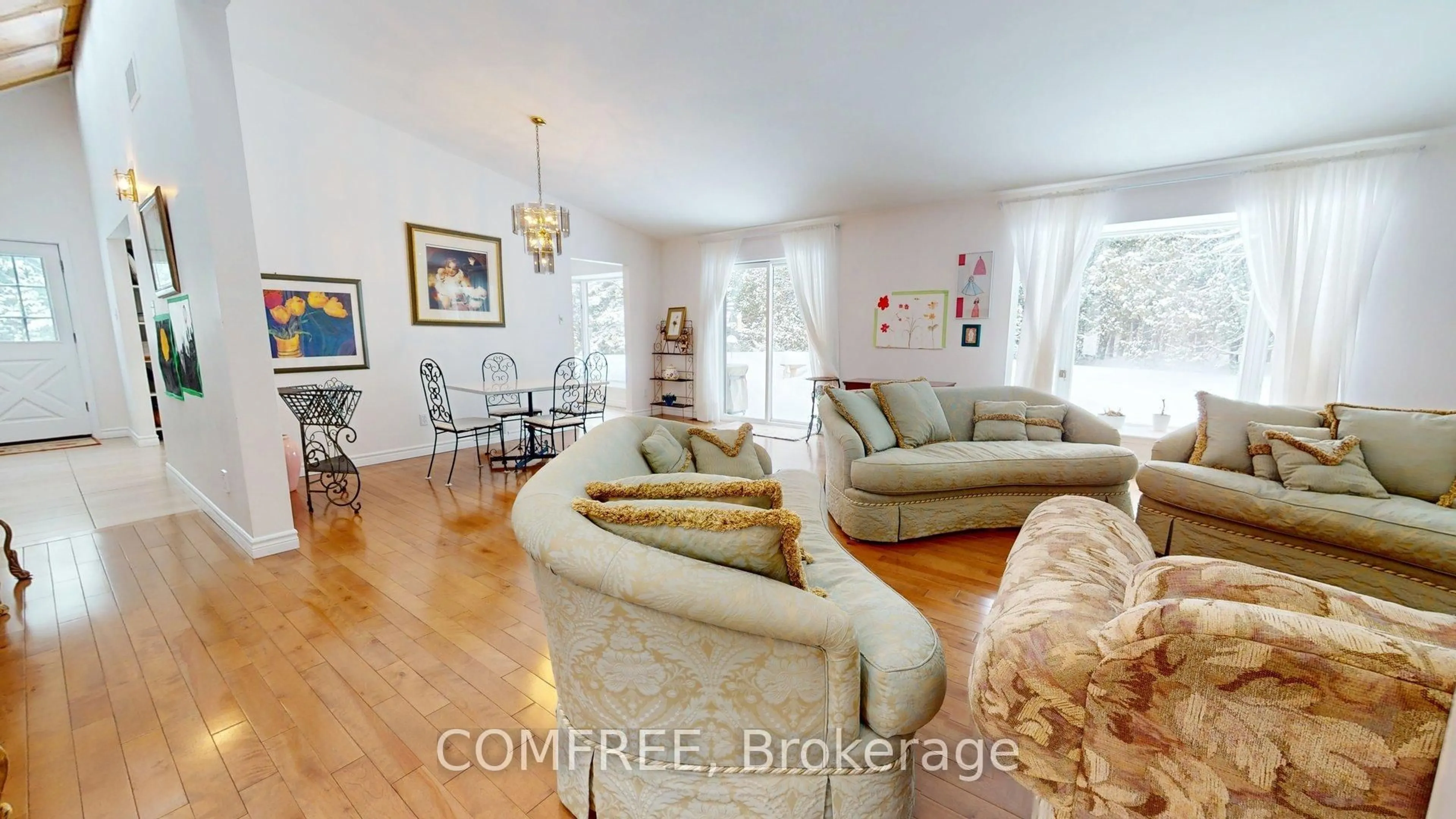 Living room with furniture, wood/laminate floor for 11954 Forest Hill Rd, North Dundas Ontario K0C 2K0