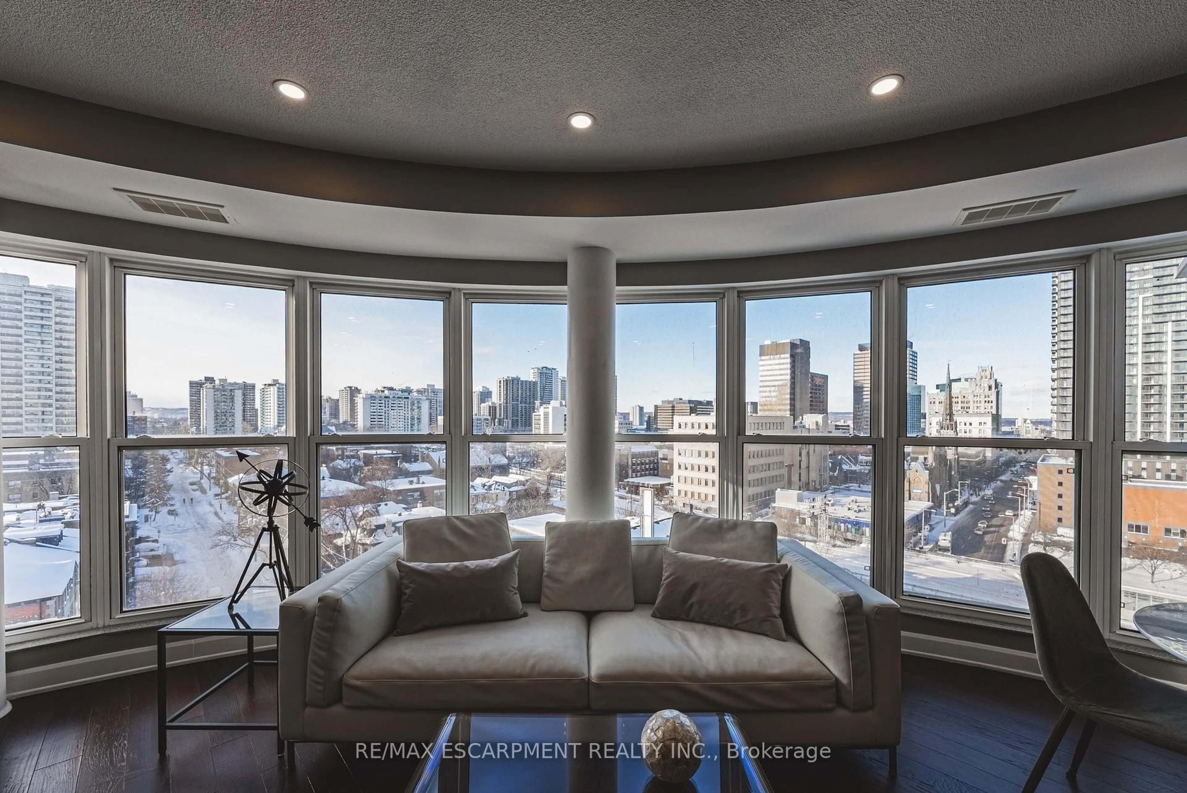 Living room with furniture, unknown for 135 James St #1014, Hamilton Ontario L8P 2Z6