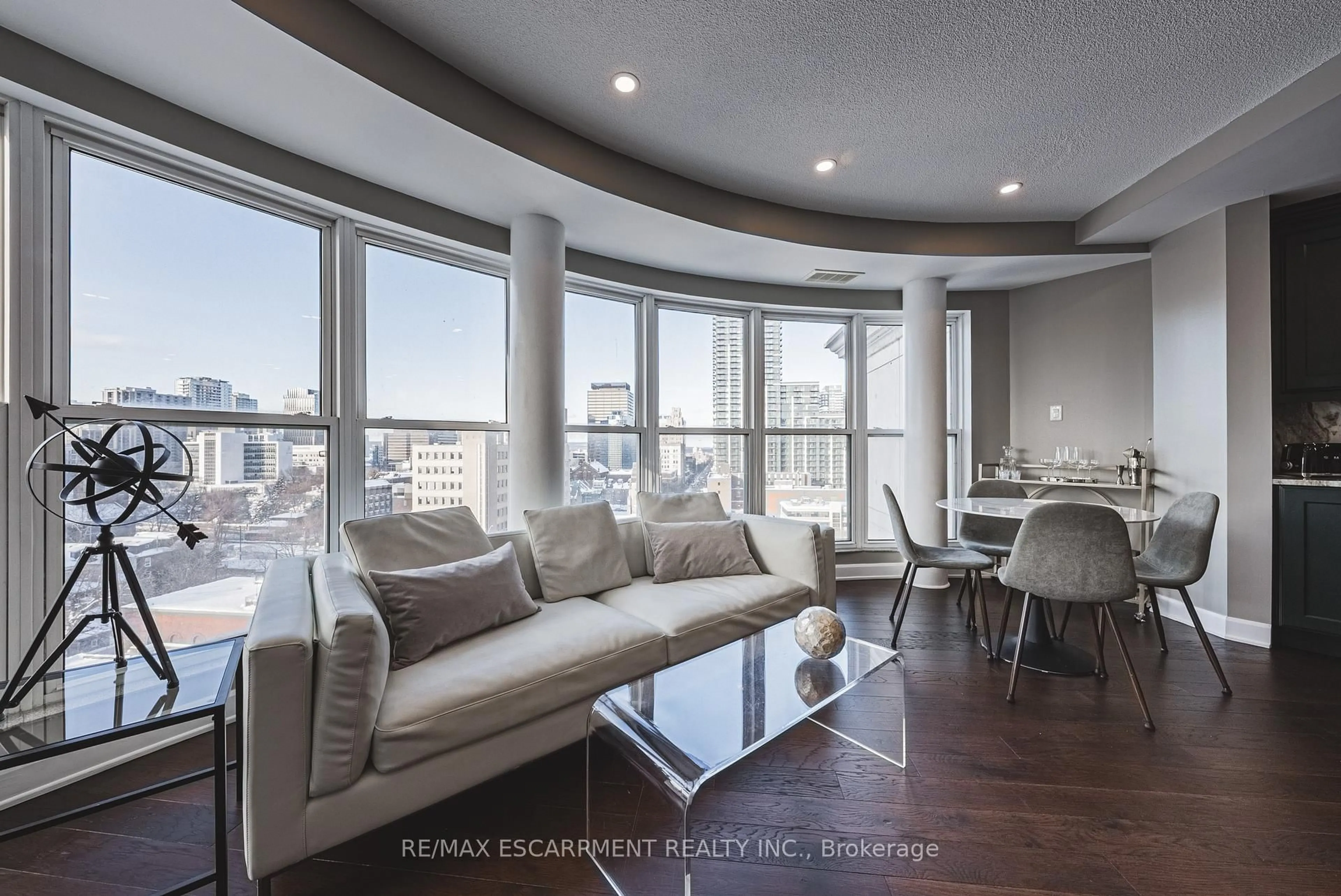 Living room with furniture, unknown for 135 James St #1014, Hamilton Ontario L8P 2Z6