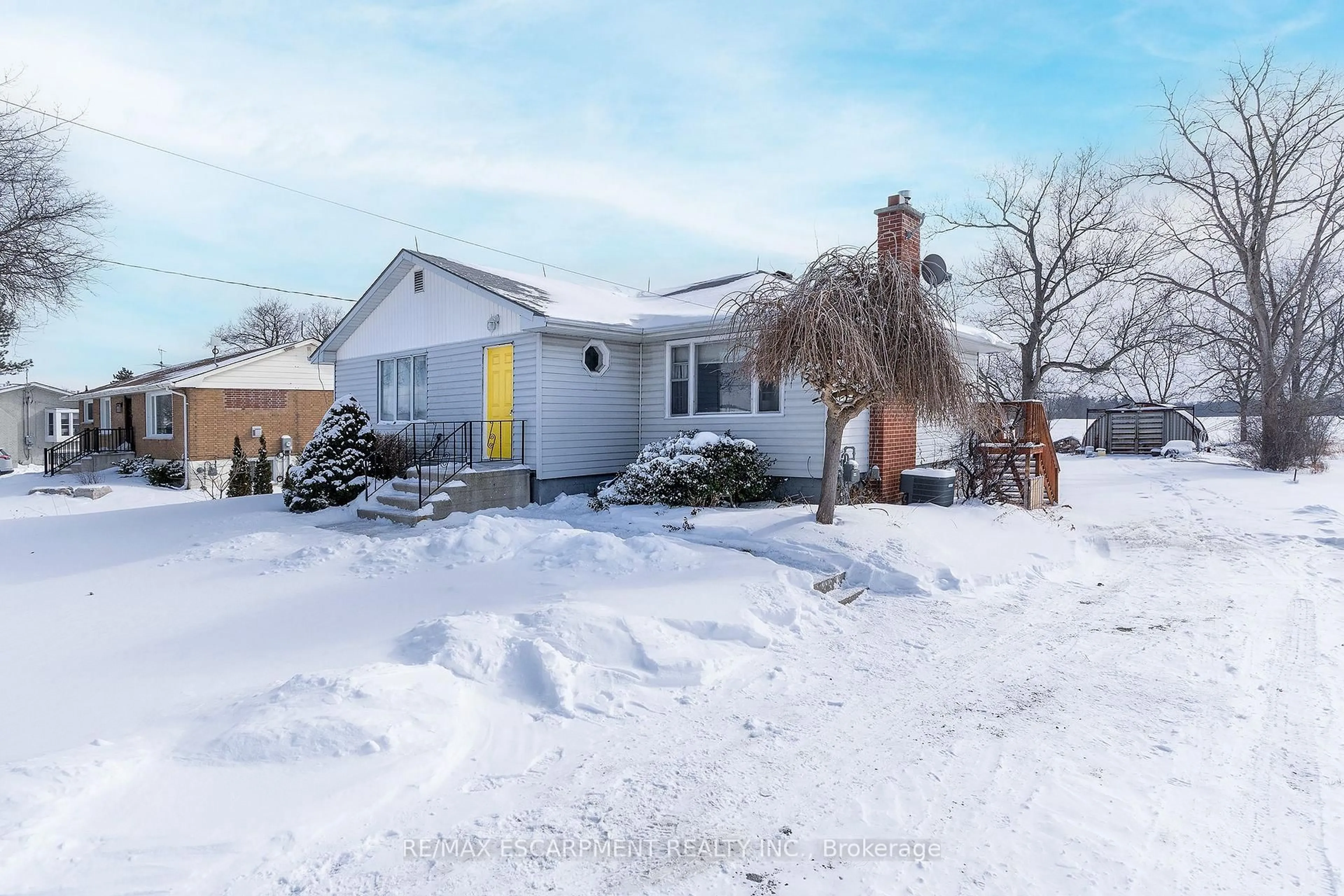 A pic from outside/outdoor area/front of a property/back of a property/a pic from drone, street for 2448 Wilson St, Hamilton Ontario L0R 1R0