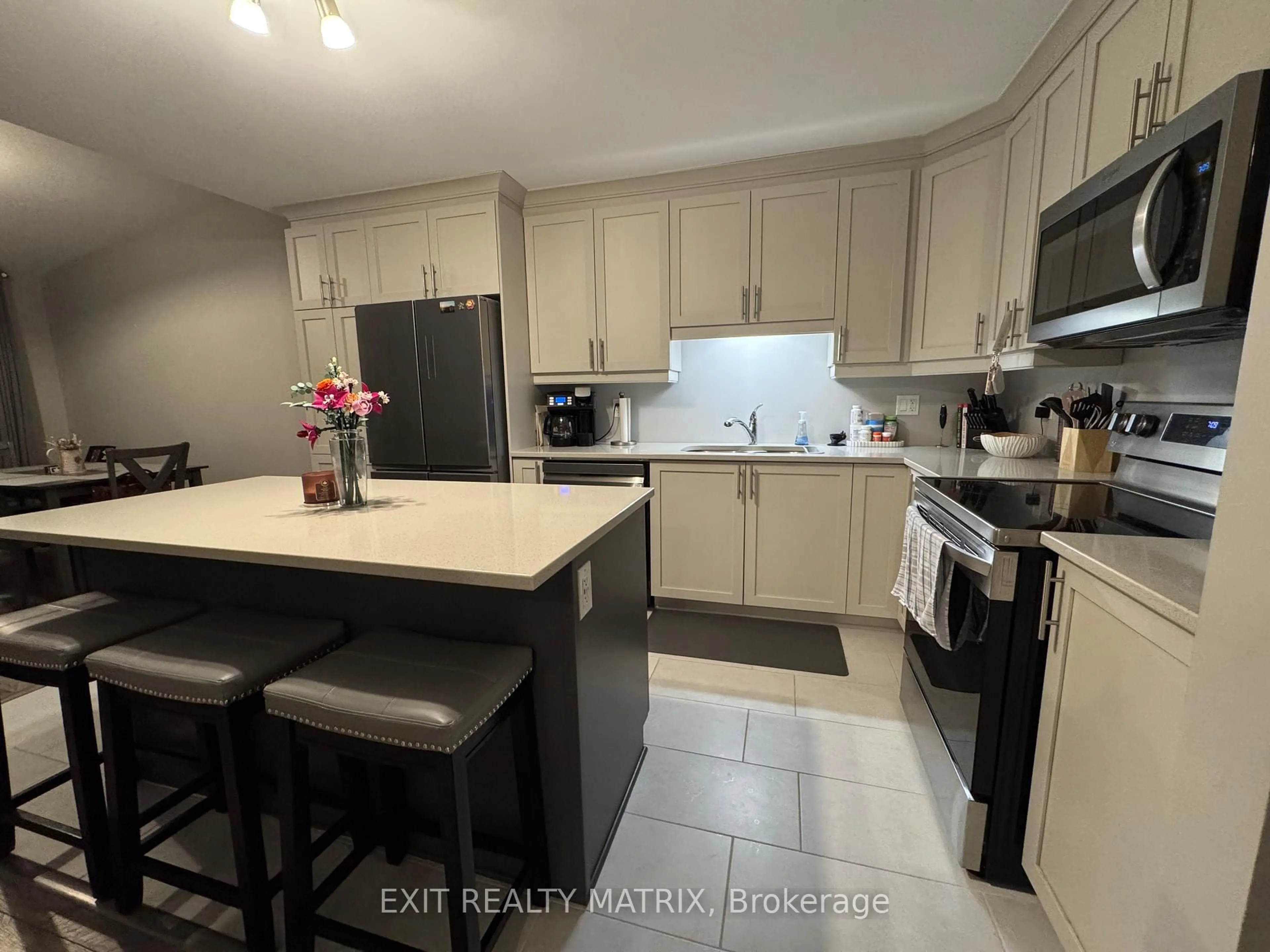 Open concept kitchen, ceramic/tile floor for 83 St Moritz Terr #9, Russell Ontario K0A 1W0