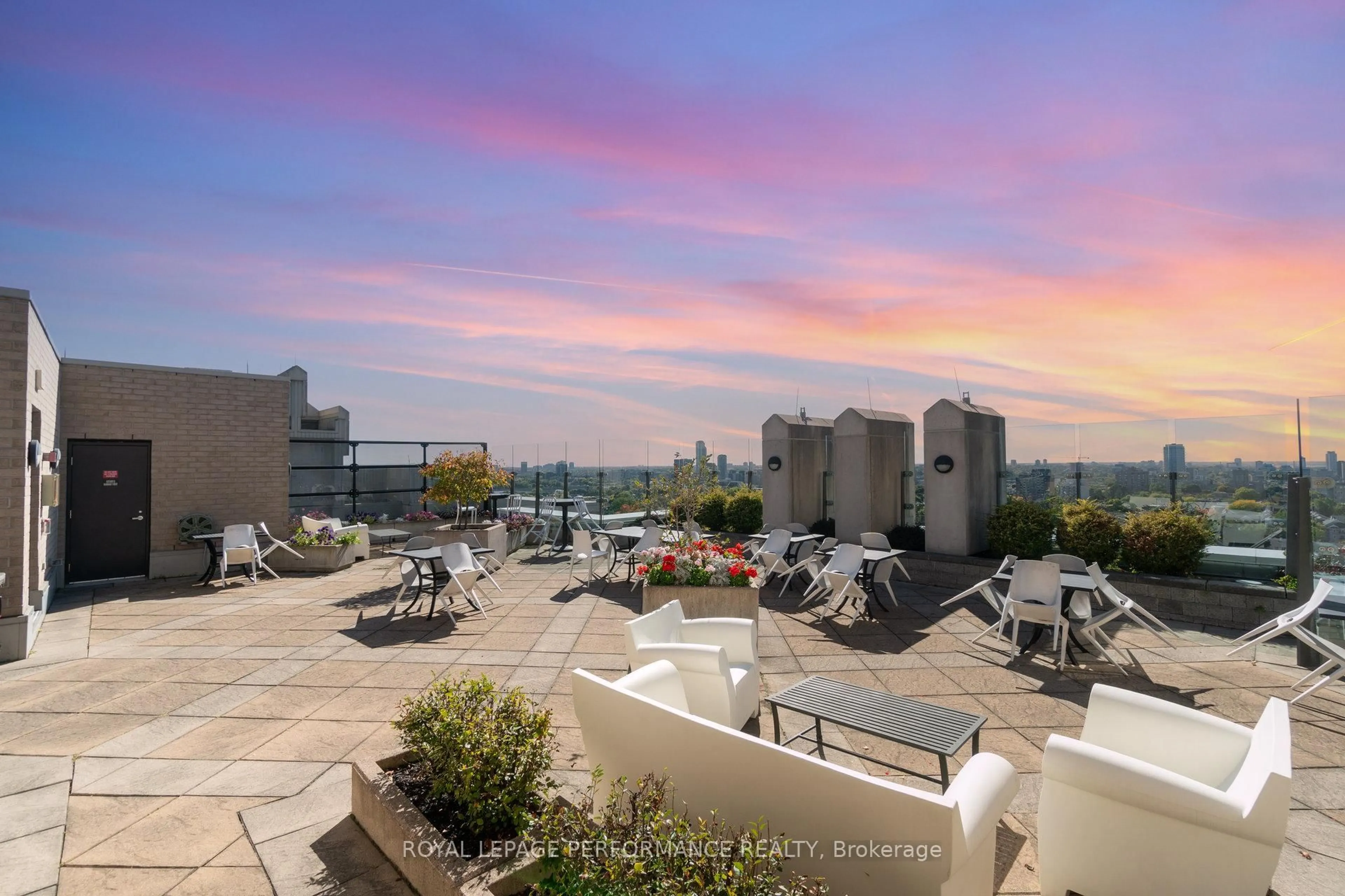 Patio, city buildings view from balcony for 245 Kent St #703, Ottawa Ontario K2P 0A5