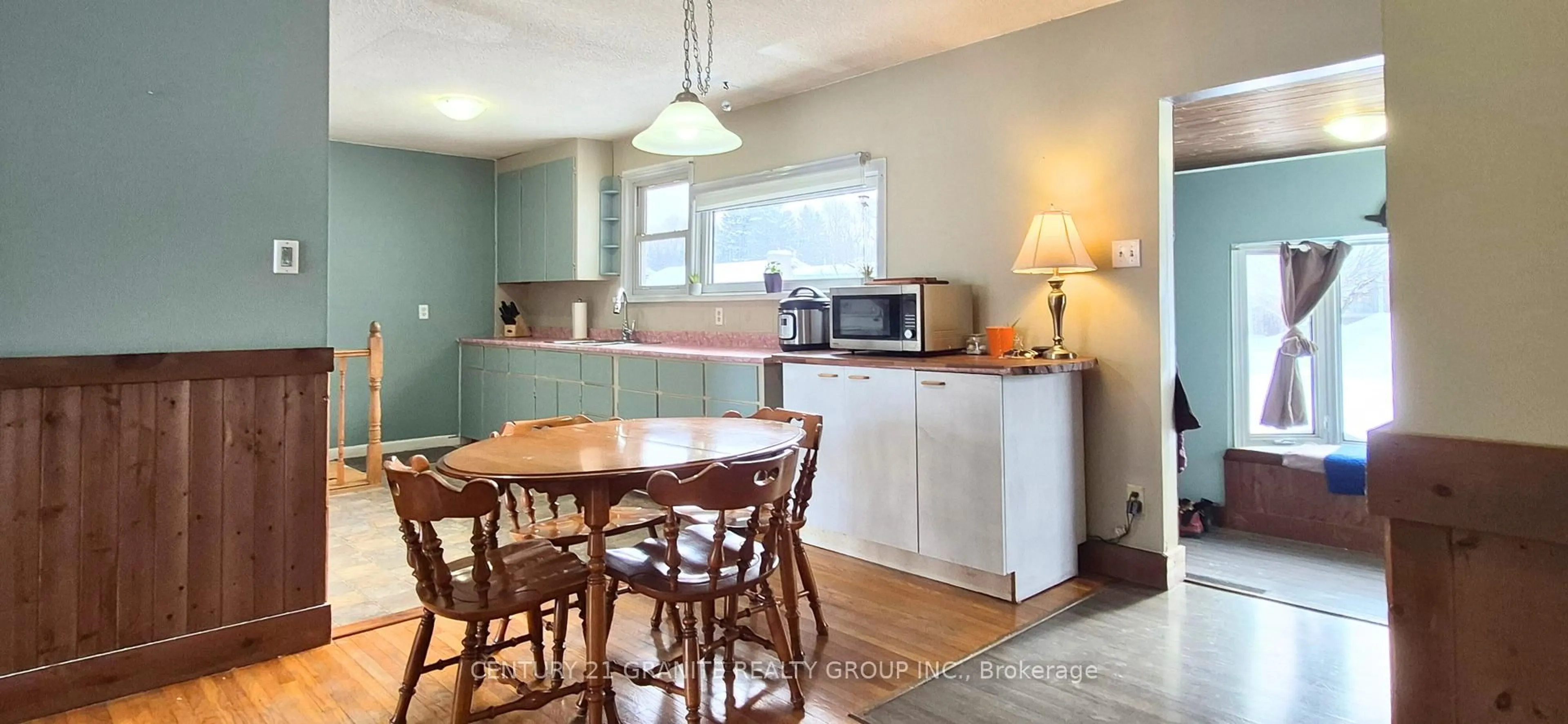 Open concept kitchen, wood/laminate floor for 10 Hemlock St, Highlands East Ontario K0L 1M0