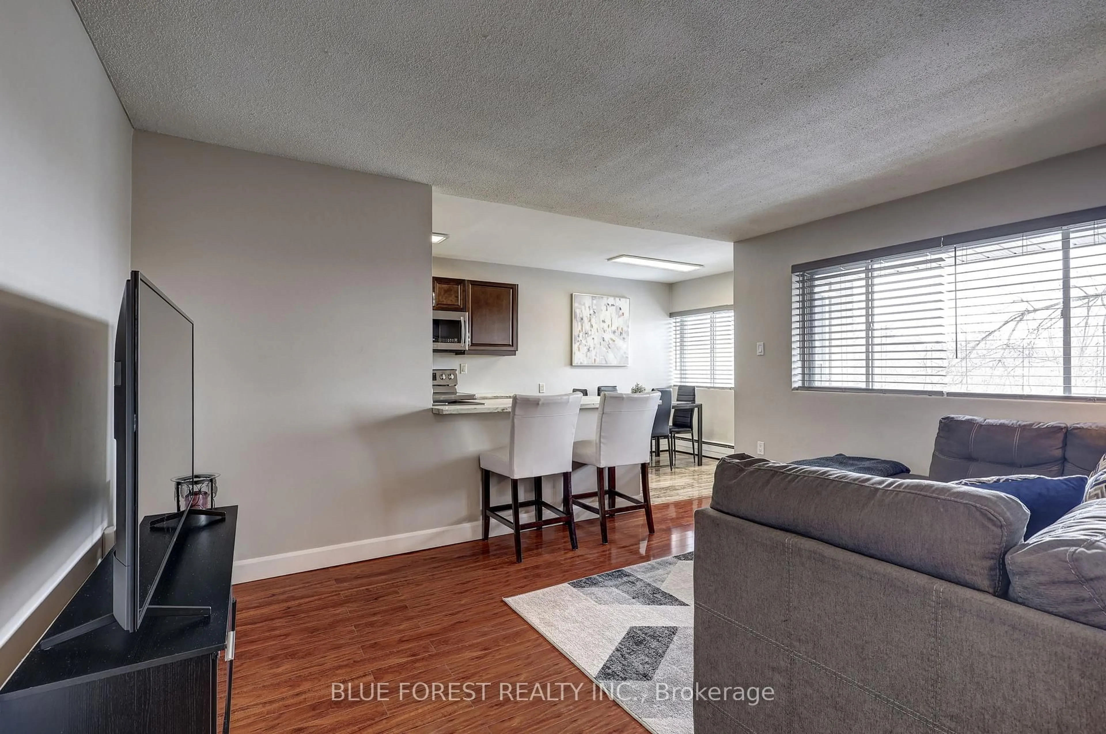 Living room with furniture, unknown for 1174 HAMILTON Rd #309, London East Ontario N5W 1A9