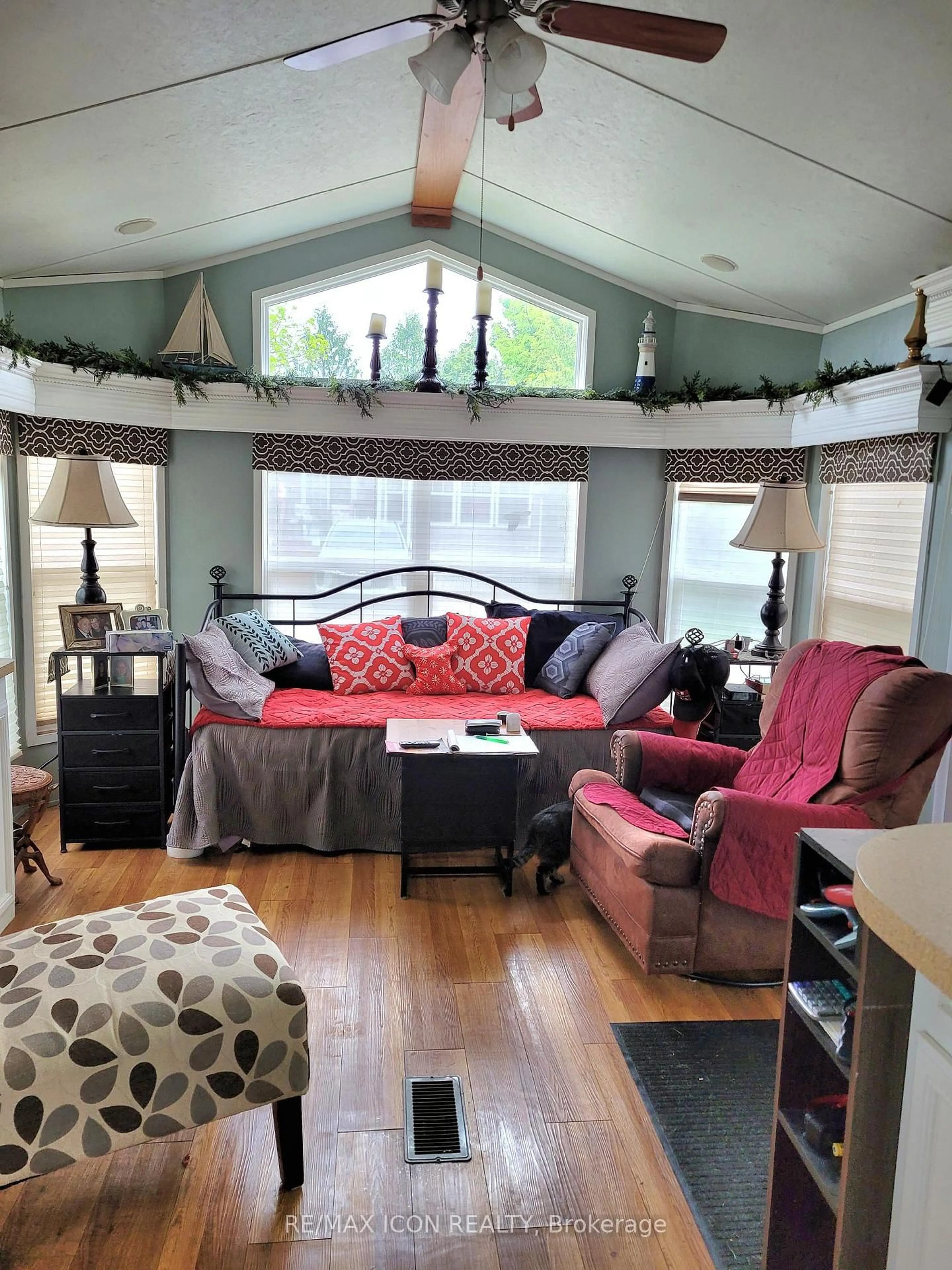 Living room with furniture, wood/laminate floor for 77719 Bluewater Highway #41 Portside Dr, Bluewater Ontario N0M 1G0