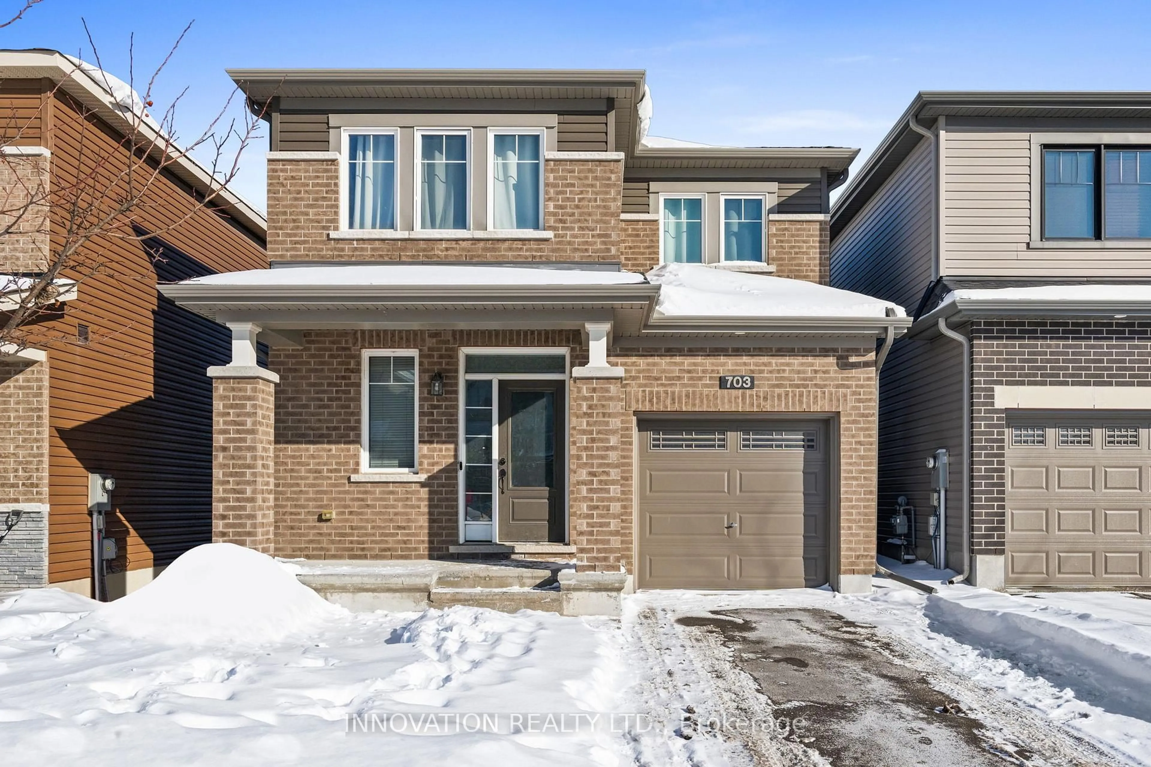 Home with brick exterior material, street for 703 Samantha Eastop Ave, Ottawa Ontario K2S 1B9