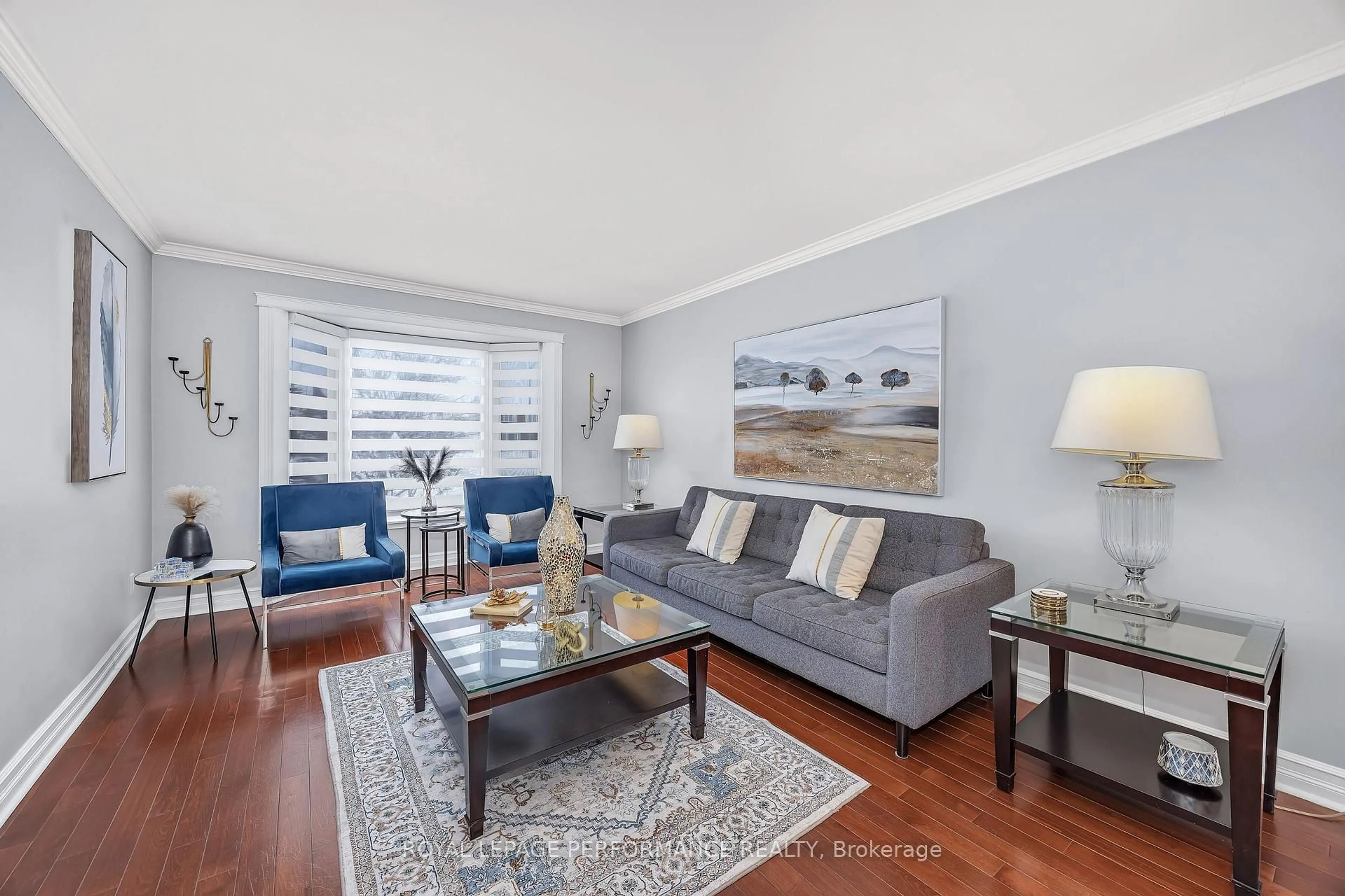 Living room with furniture, wood/laminate floor for 1310 Prestone Dr, Orleans Ontario K1E 2Z6