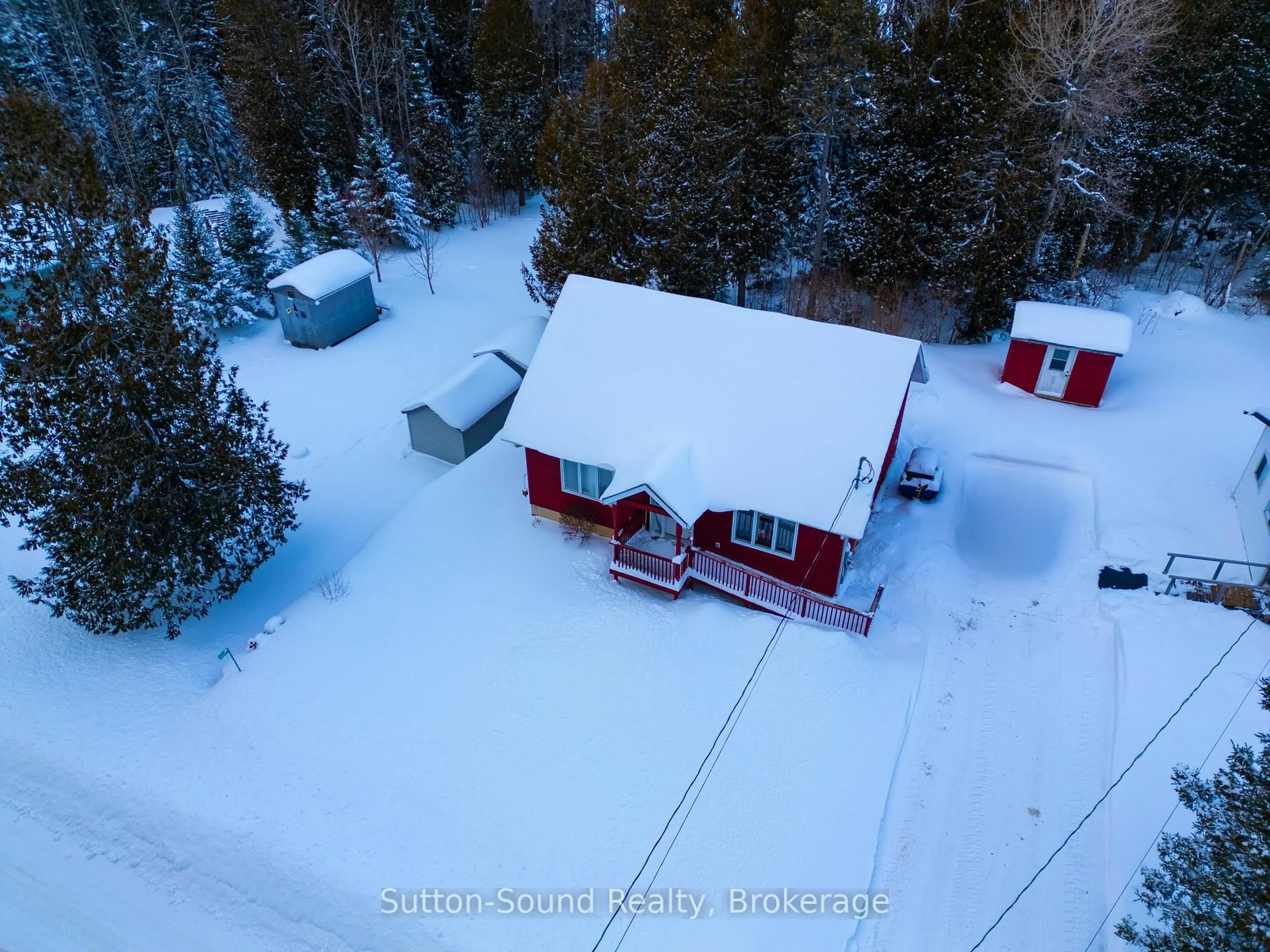 A pic from outside/outdoor area/front of a property/back of a property/a pic from drone, street for 554 Stokes Bay Rd, Northern Bruce Peninsula Ontario N0H 2M0