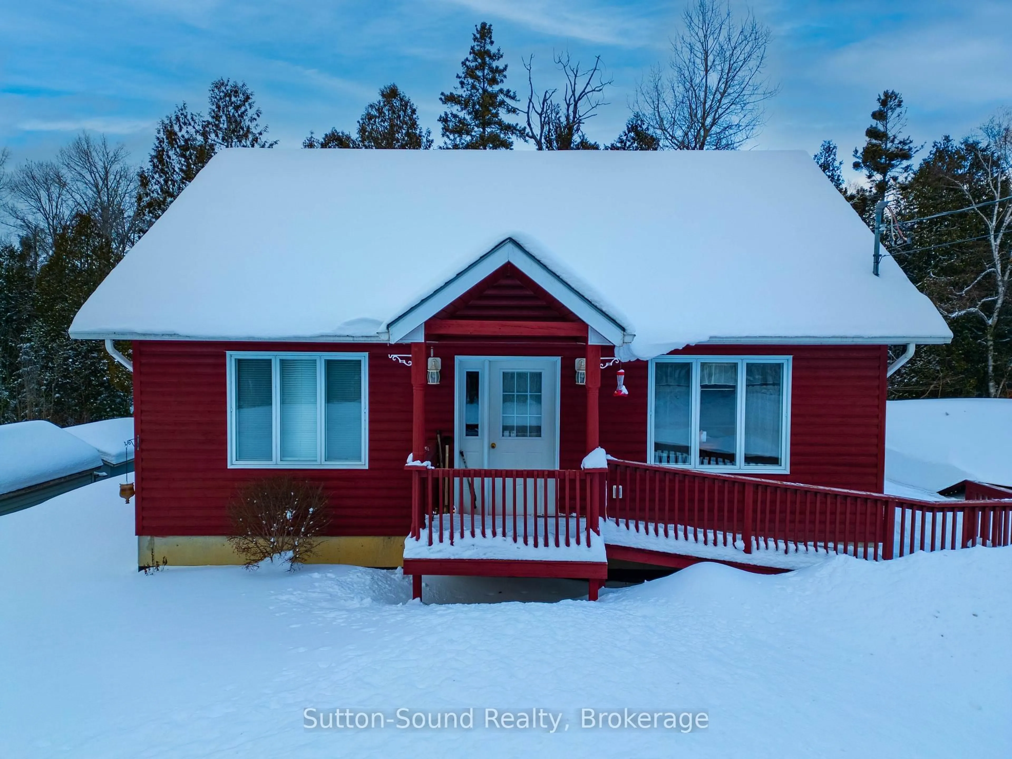 A pic from outside/outdoor area/front of a property/back of a property/a pic from drone, street for 554 Stokes Bay Rd, Northern Bruce Peninsula Ontario N0H 2M0