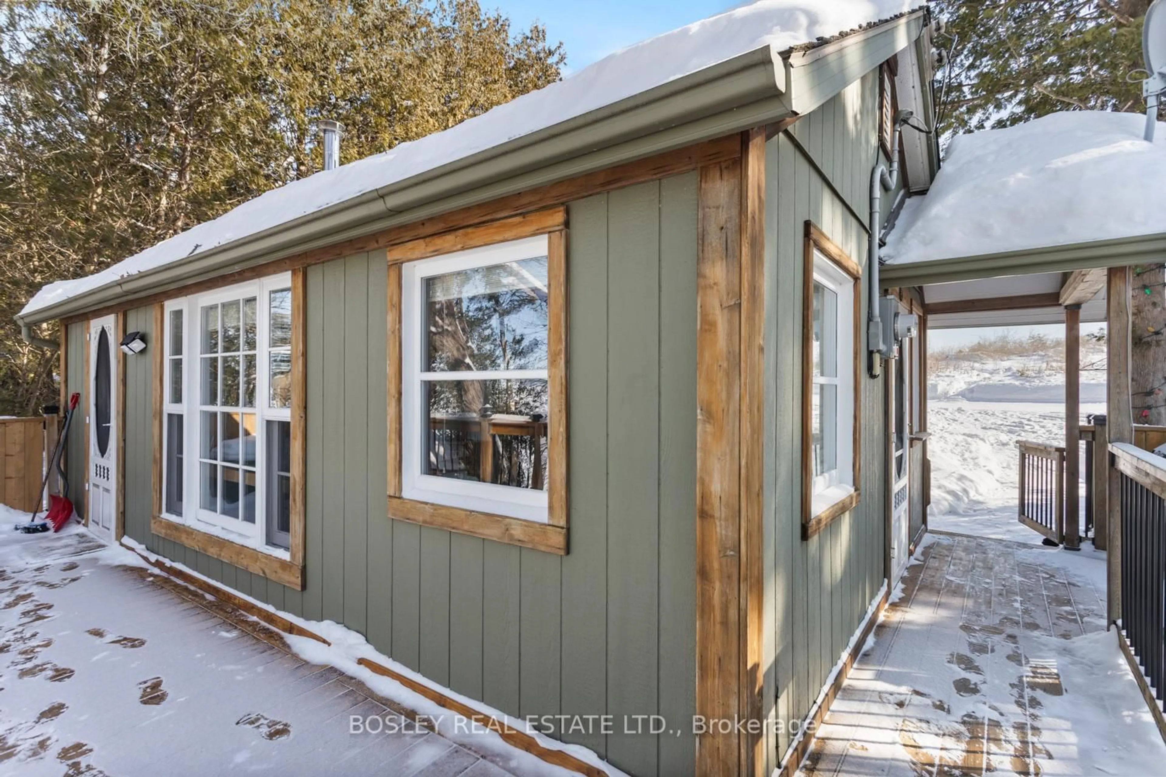 Home with vinyl exterior material, street for 6812 Shearer Point Rd, Alnwick/Haldimand Ontario K0K 2X0