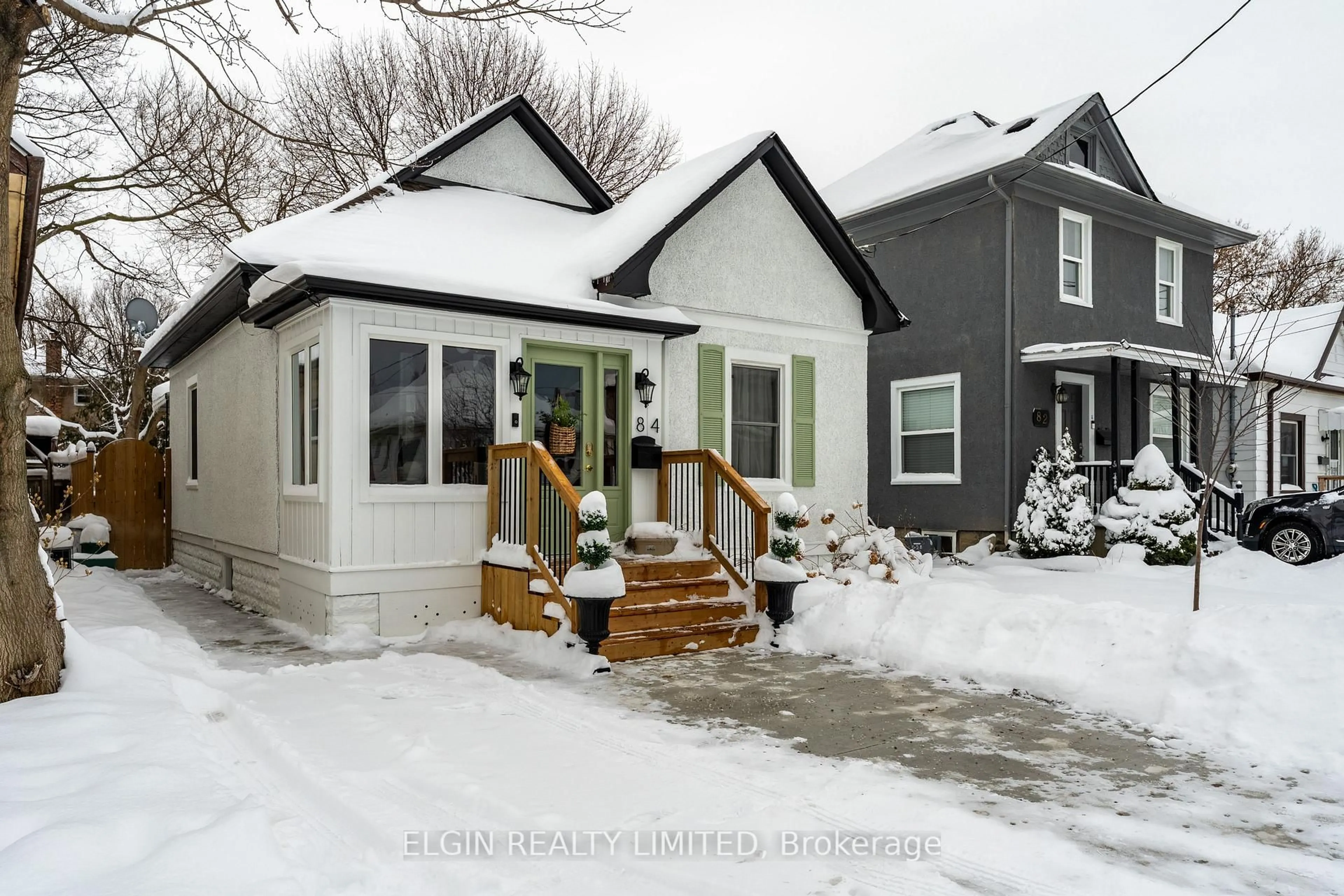 Home with vinyl exterior material, street for 84 Pleasant Ave, St. Catharines Ontario L2R 1Y1
