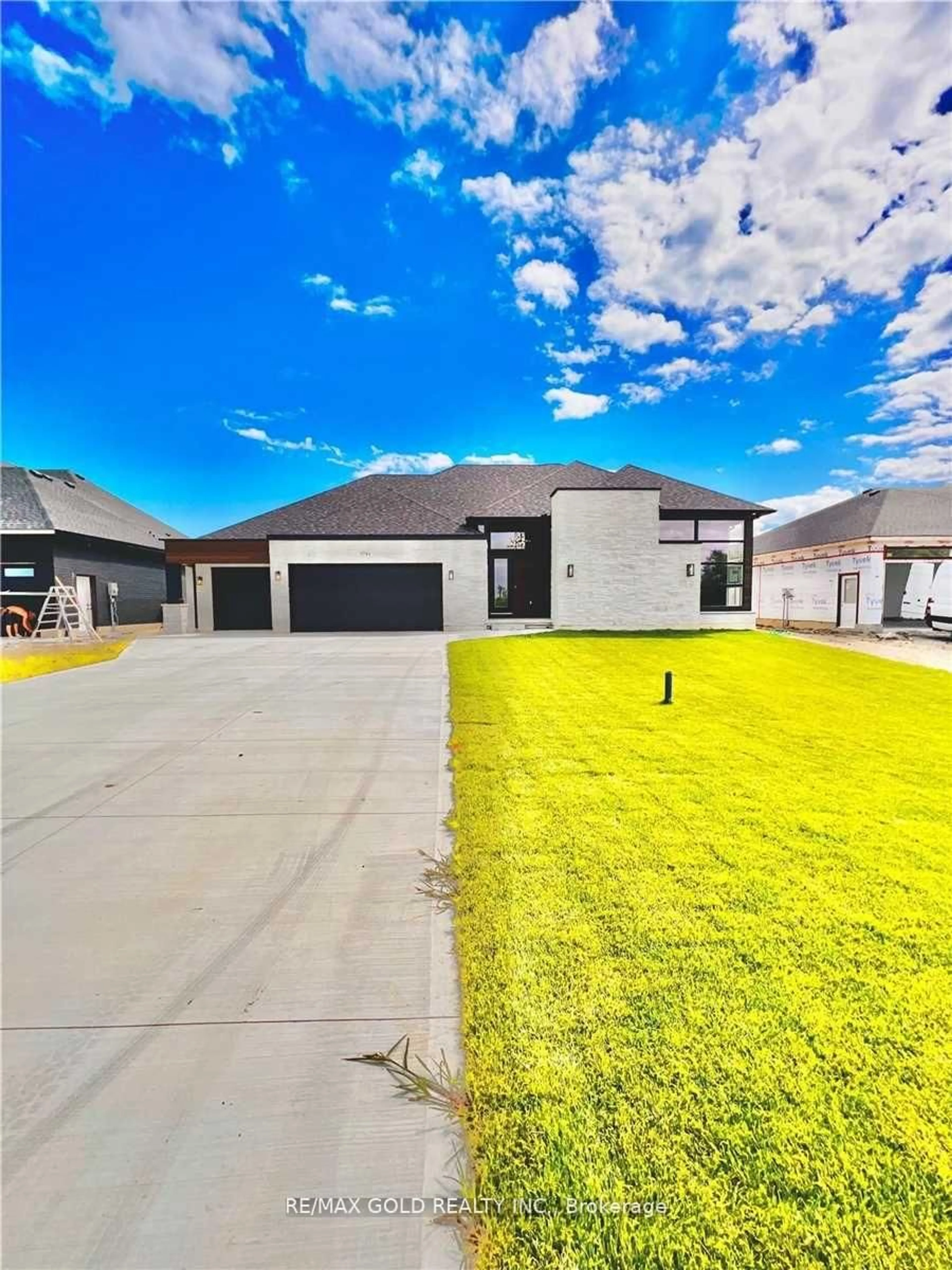 A pic from outside/outdoor area/front of a property/back of a property/a pic from drone, street for 3761 Queen St, Plympton-Wyoming Ontario N0N 1E0