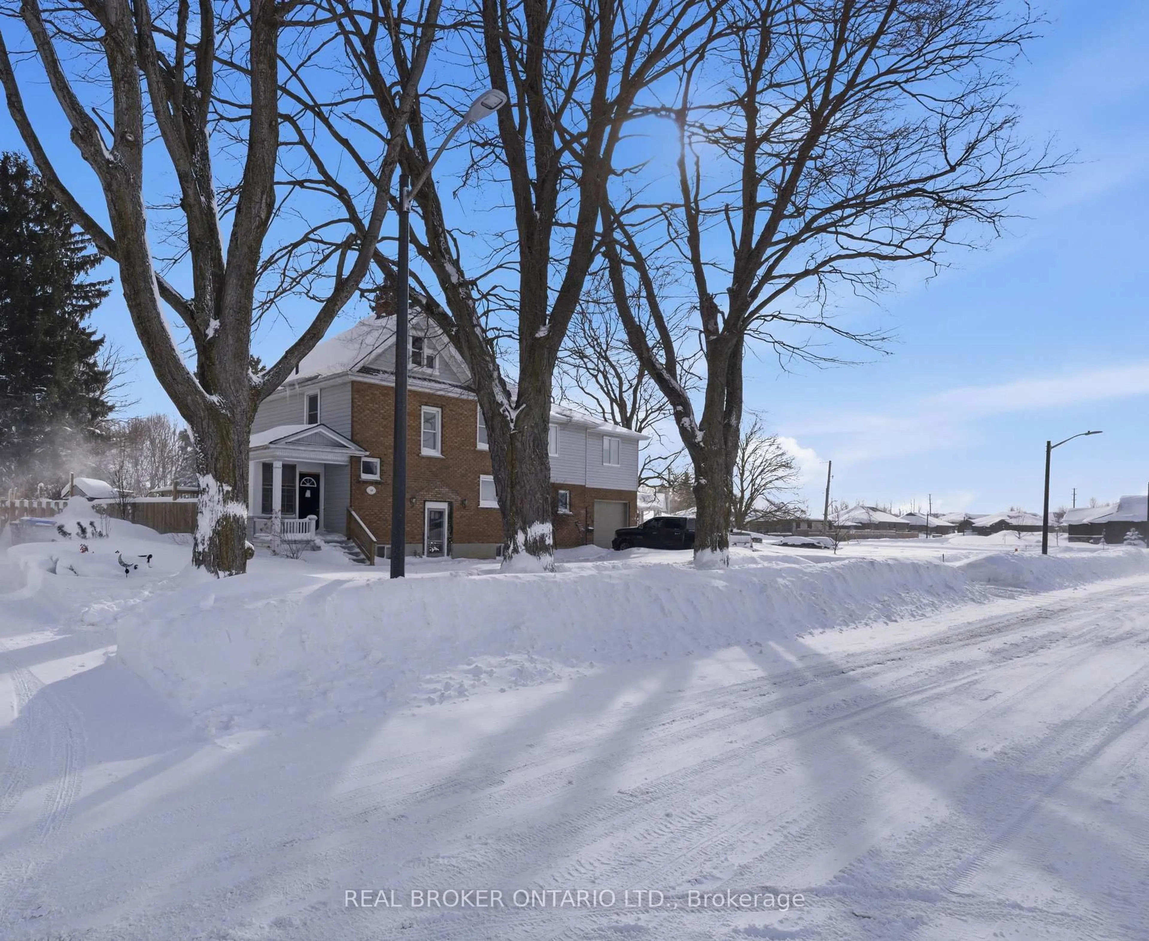 A pic from outside/outdoor area/front of a property/back of a property/a pic from drone, street for 540 Wellington Ave, North Perth Ontario N4W 2J5