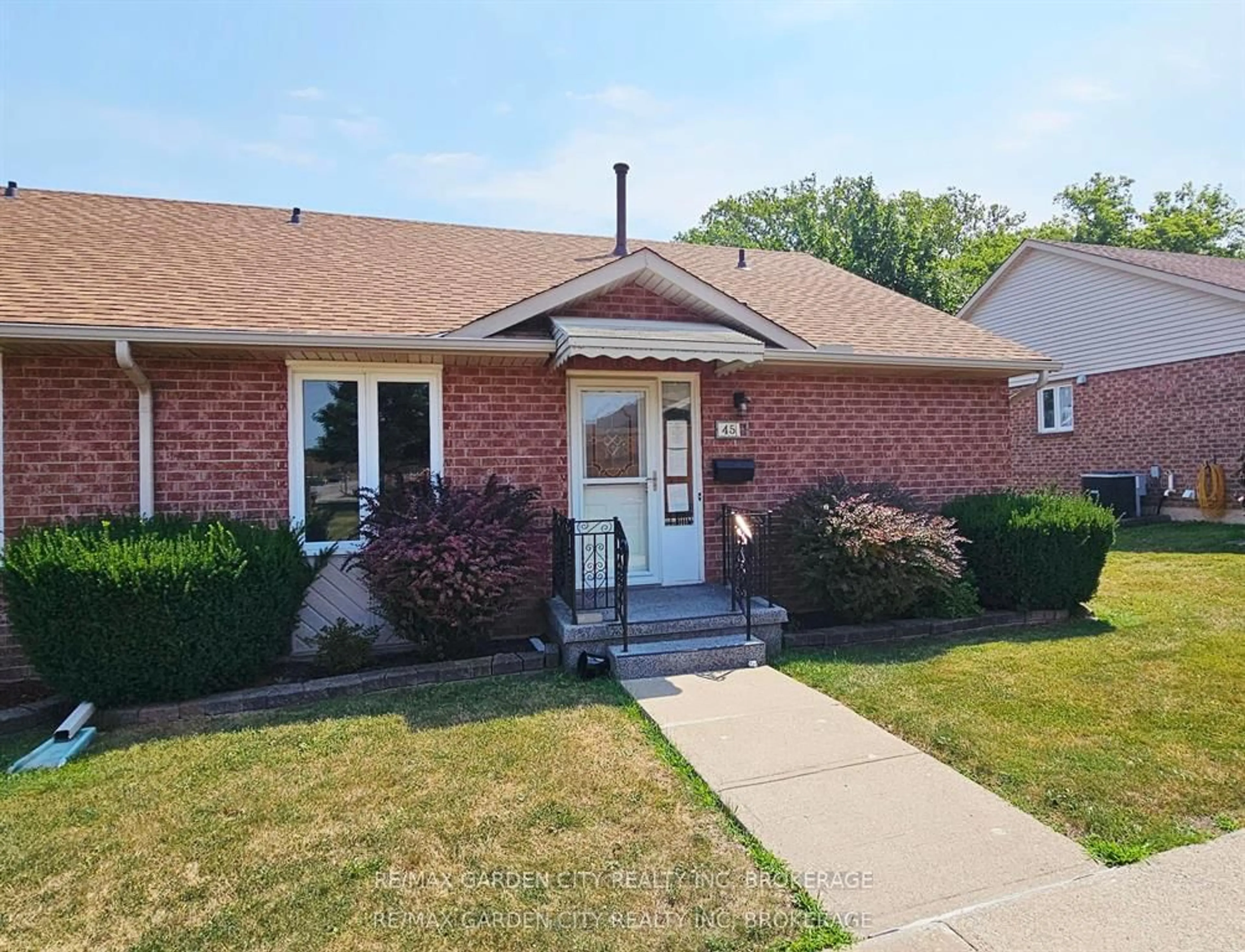 Home with brick exterior material, street for 122 BUNTING Rd #45, St. Catharines Ontario L2P 3X7