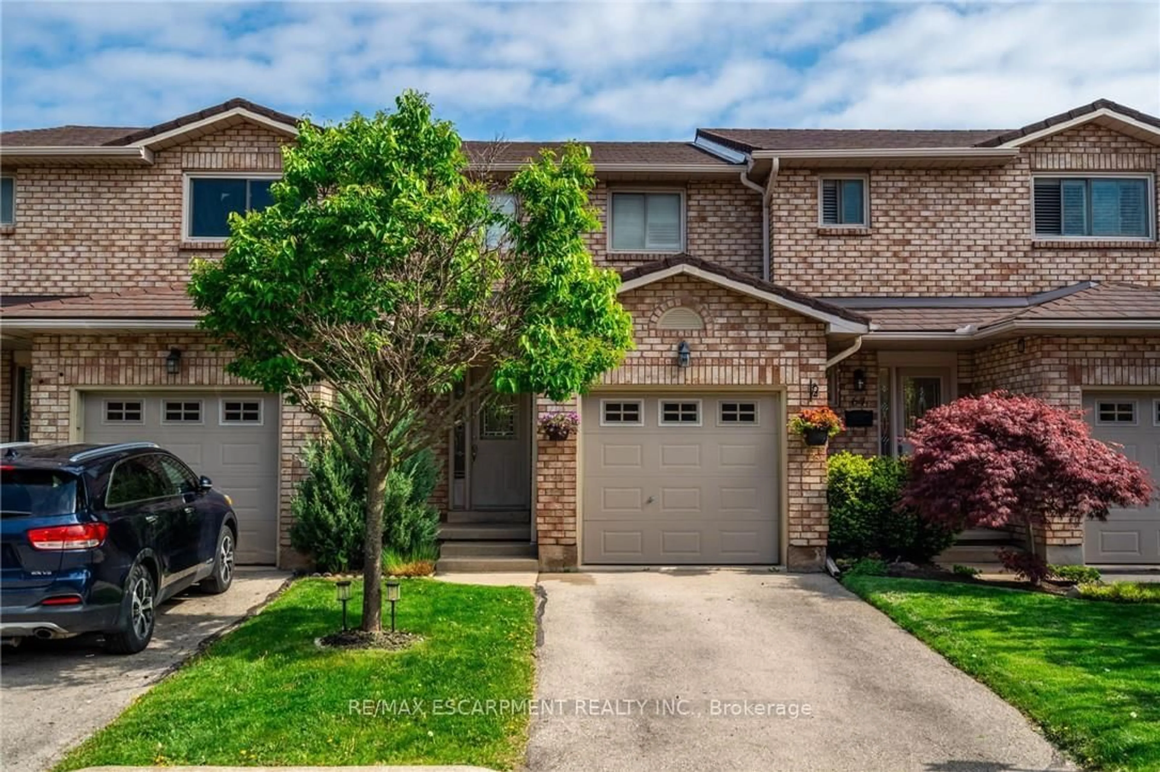 Home with brick exterior material, street for 391 Stone Church Rd #63, Hamilton Ontario L8B 2H3