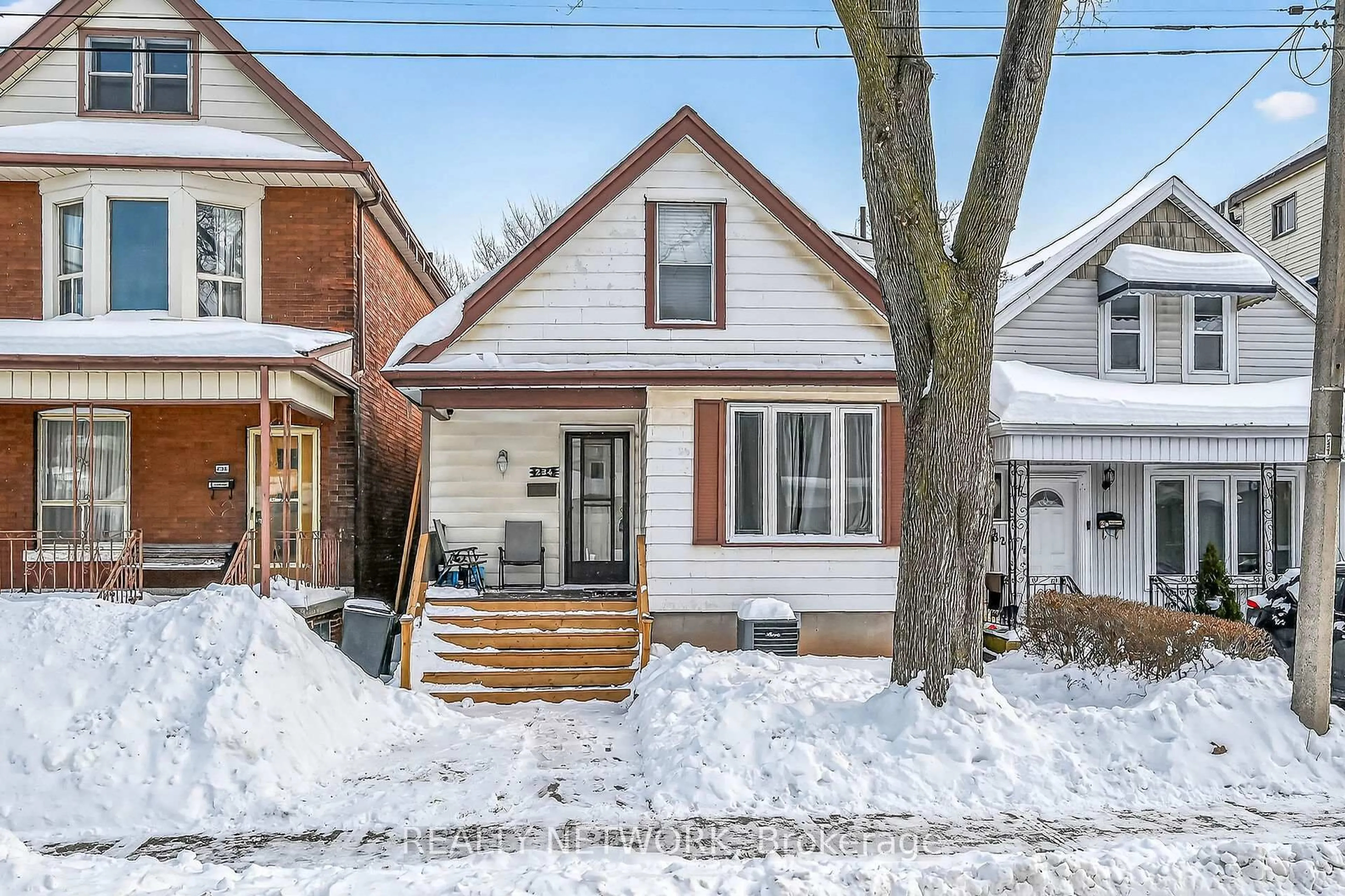 Home with brick exterior material, street for 234 Balmoral Ave, Hamilton Ontario L8L 7S2