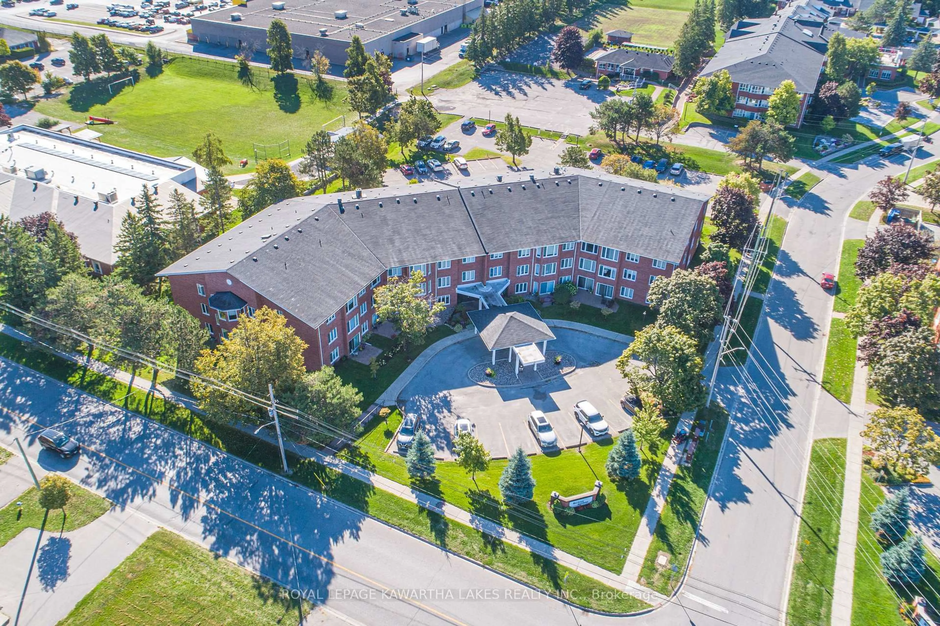 A pic from outside/outdoor area/front of a property/back of a property/a pic from drone, unknown for 2 Heritage Way #108, Kawartha Lakes Ontario K9V 5P5