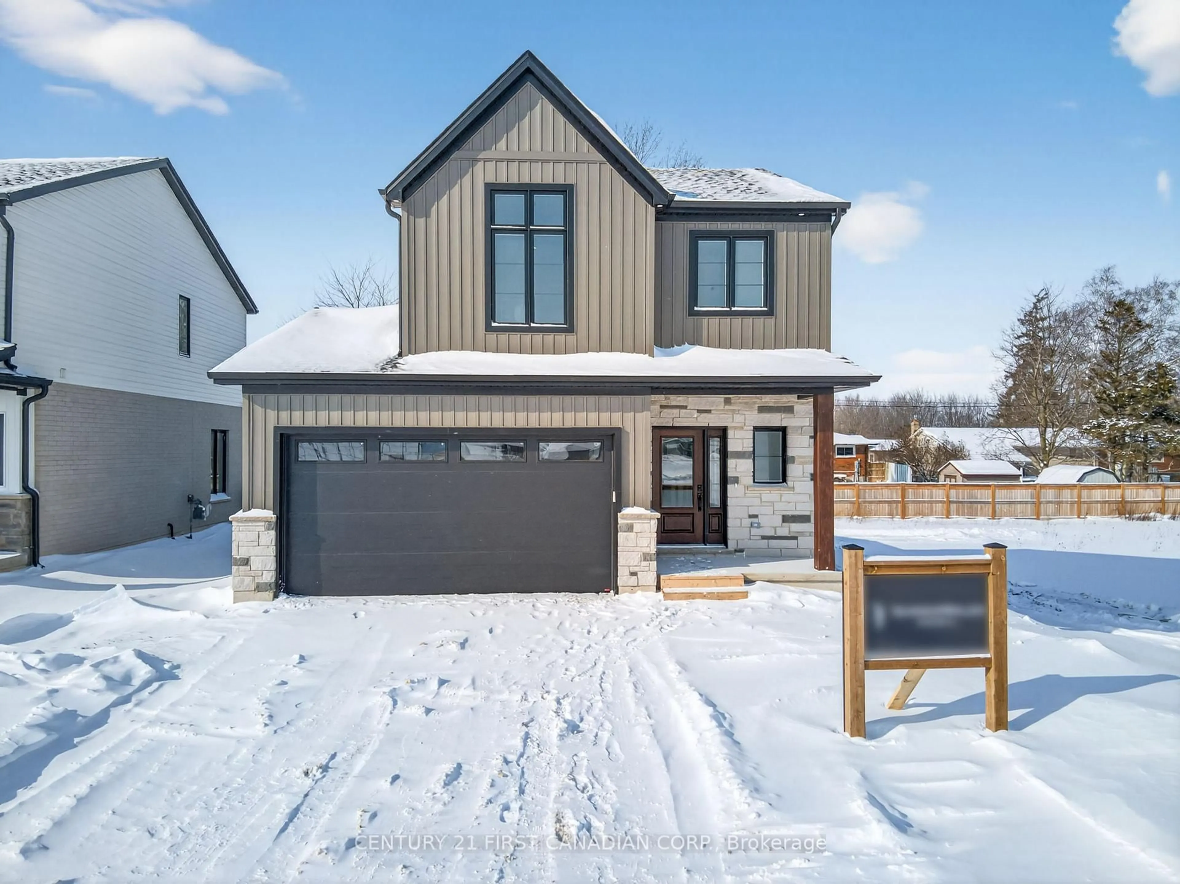 Home with brick exterior material, street for 9 Twynstra St, North Middlesex Ontario N0M 1A0