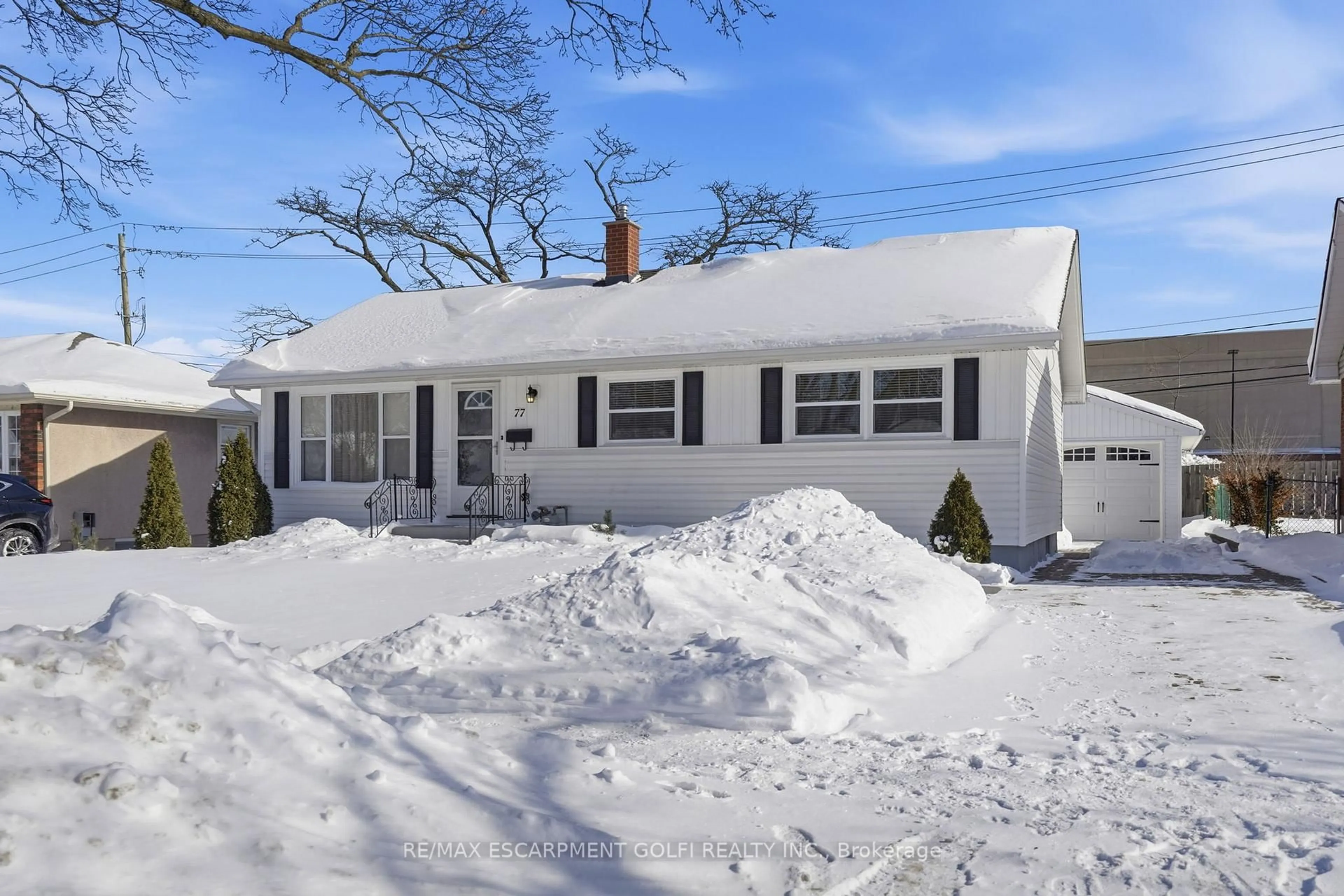 Home with vinyl exterior material, street for 77 Jacobson Ave, St. Catharines Ontario L2T 3A2