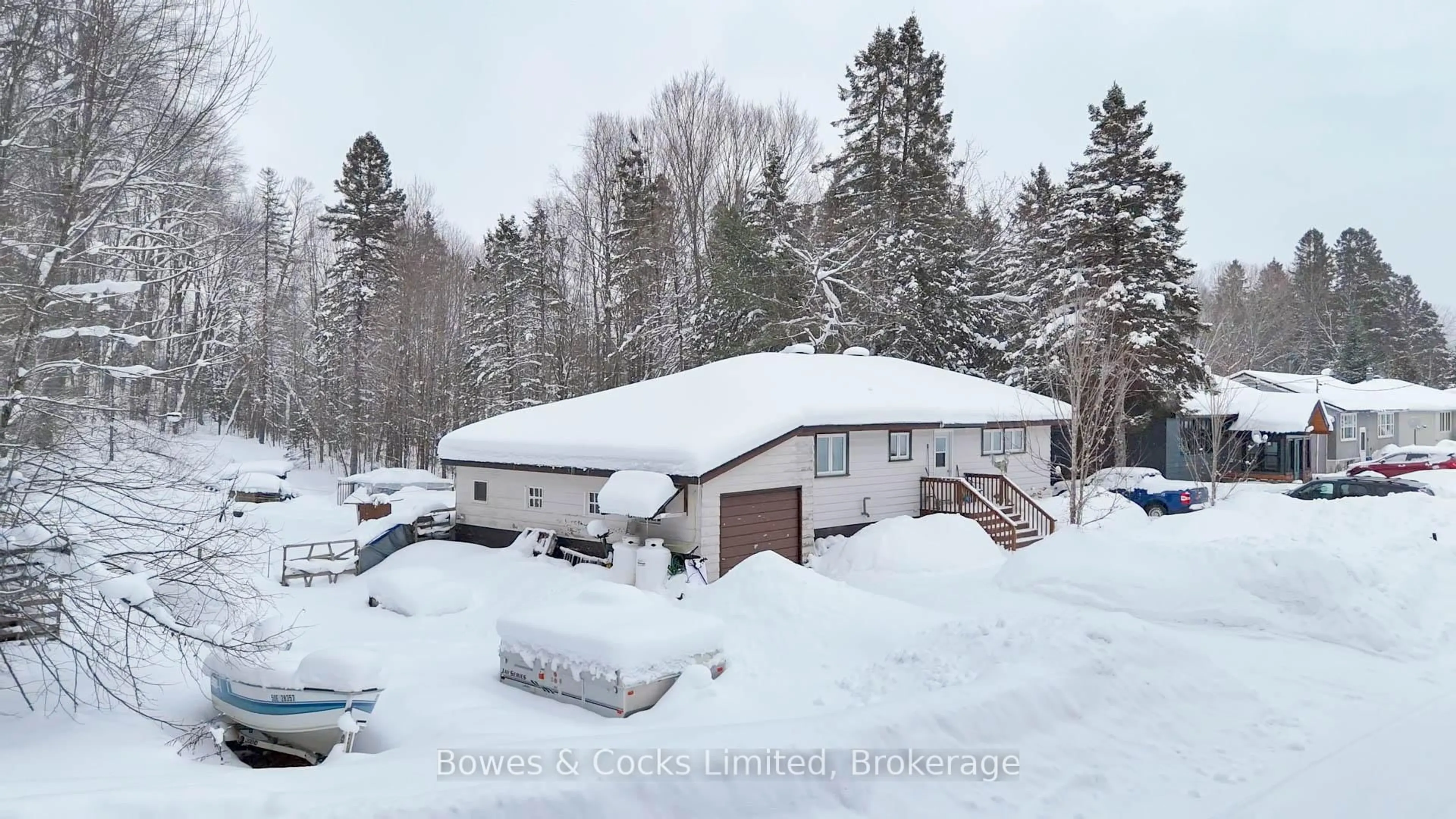 A pic from outside/outdoor area/front of a property/back of a property/a pic from drone, unknown for 1052 Estates Rd, Highlands East Ontario K0L 1C0