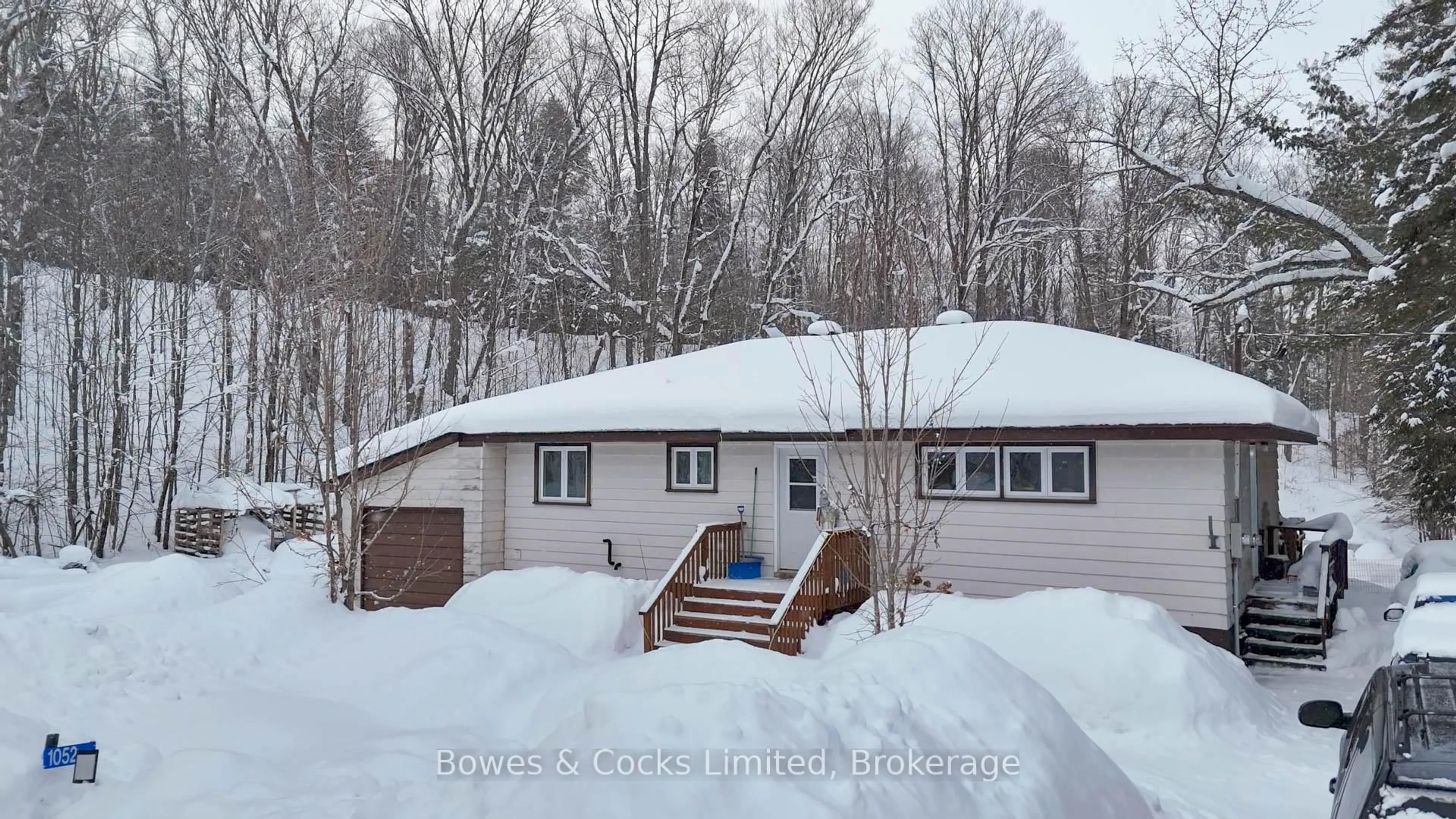 A pic from outside/outdoor area/front of a property/back of a property/a pic from drone, unknown for 1052 Estates Rd, Highlands East Ontario K0L 1C0