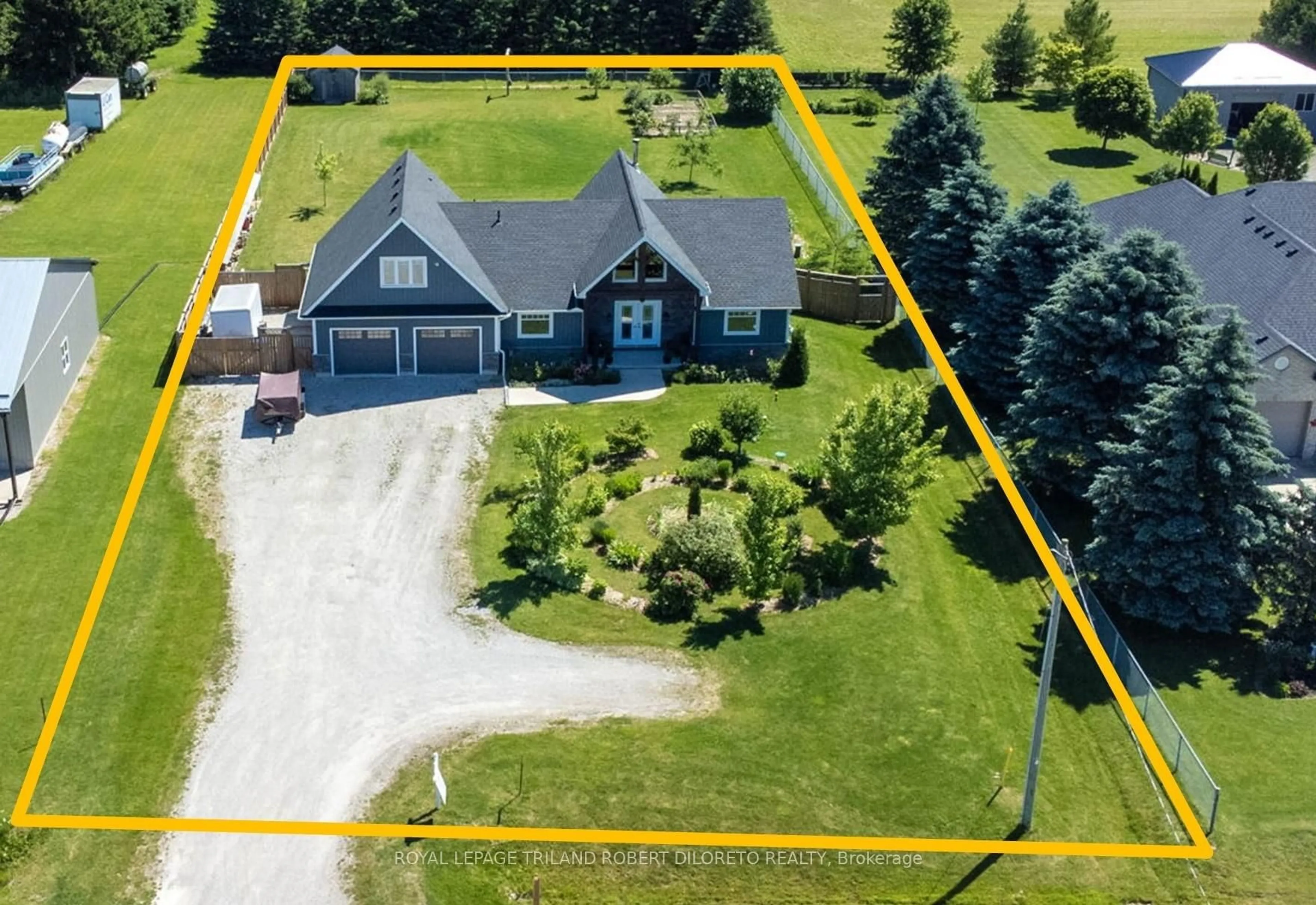 A pic from outside/outdoor area/front of a property/back of a property/a pic from drone, street for 22910 Highbury Ave, Middlesex Centre Ontario N0M 2A0