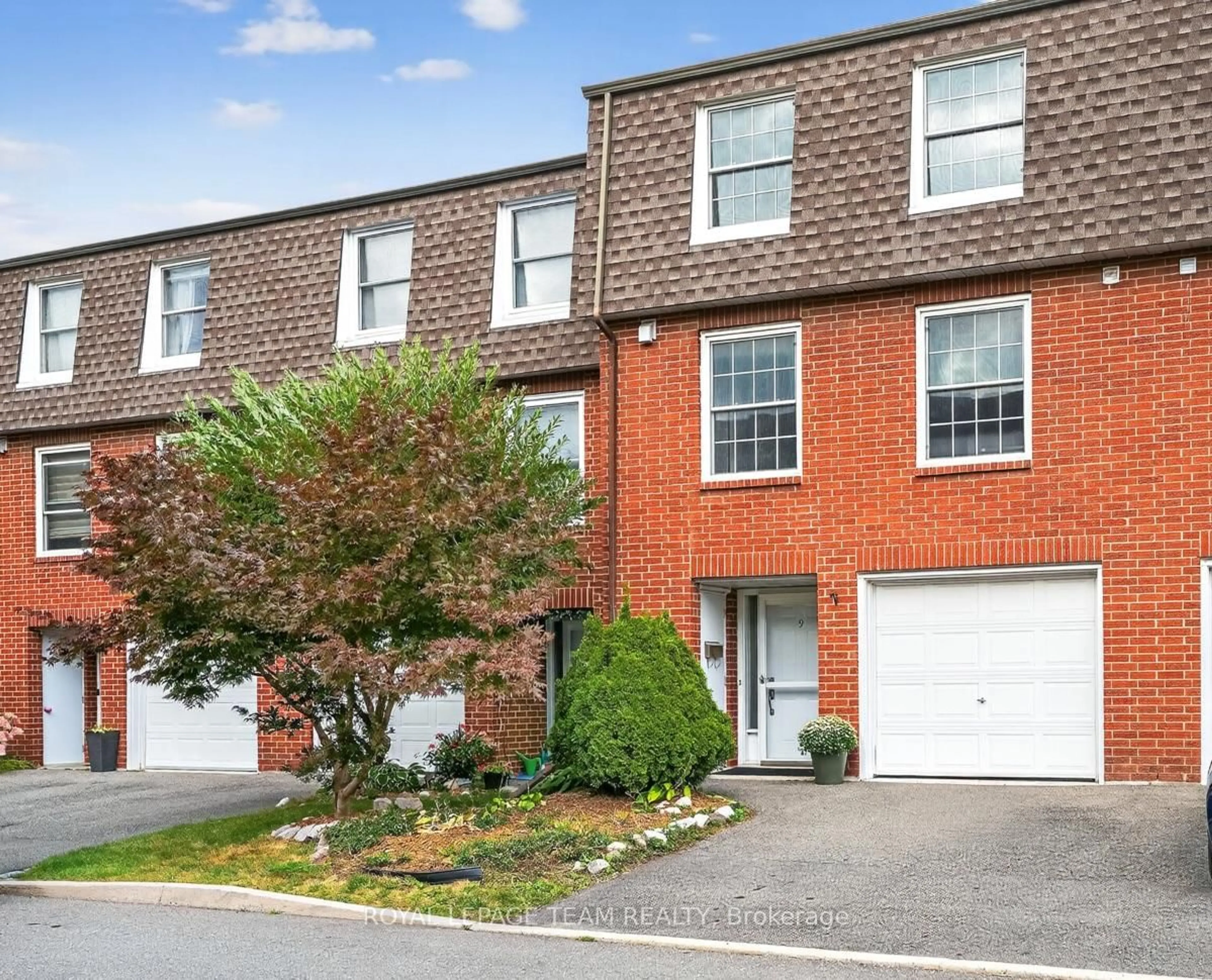 Home with brick exterior material, street for 9 Moorside Private, Ottawa Ontario K2C 3P4