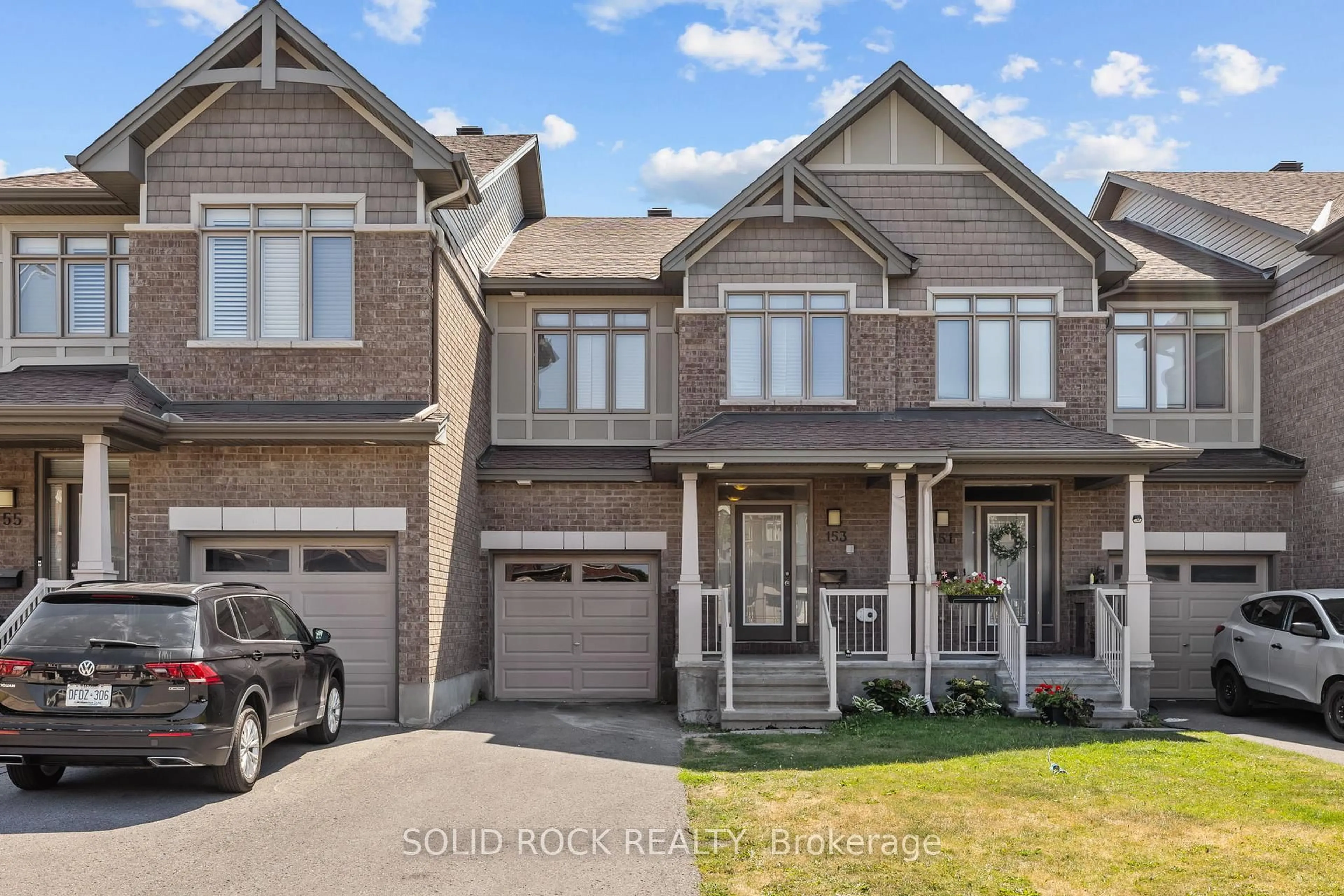 Home with brick exterior material, street for 153 Hawkshaw Cres, Ottawa Ontario K2J 5P8