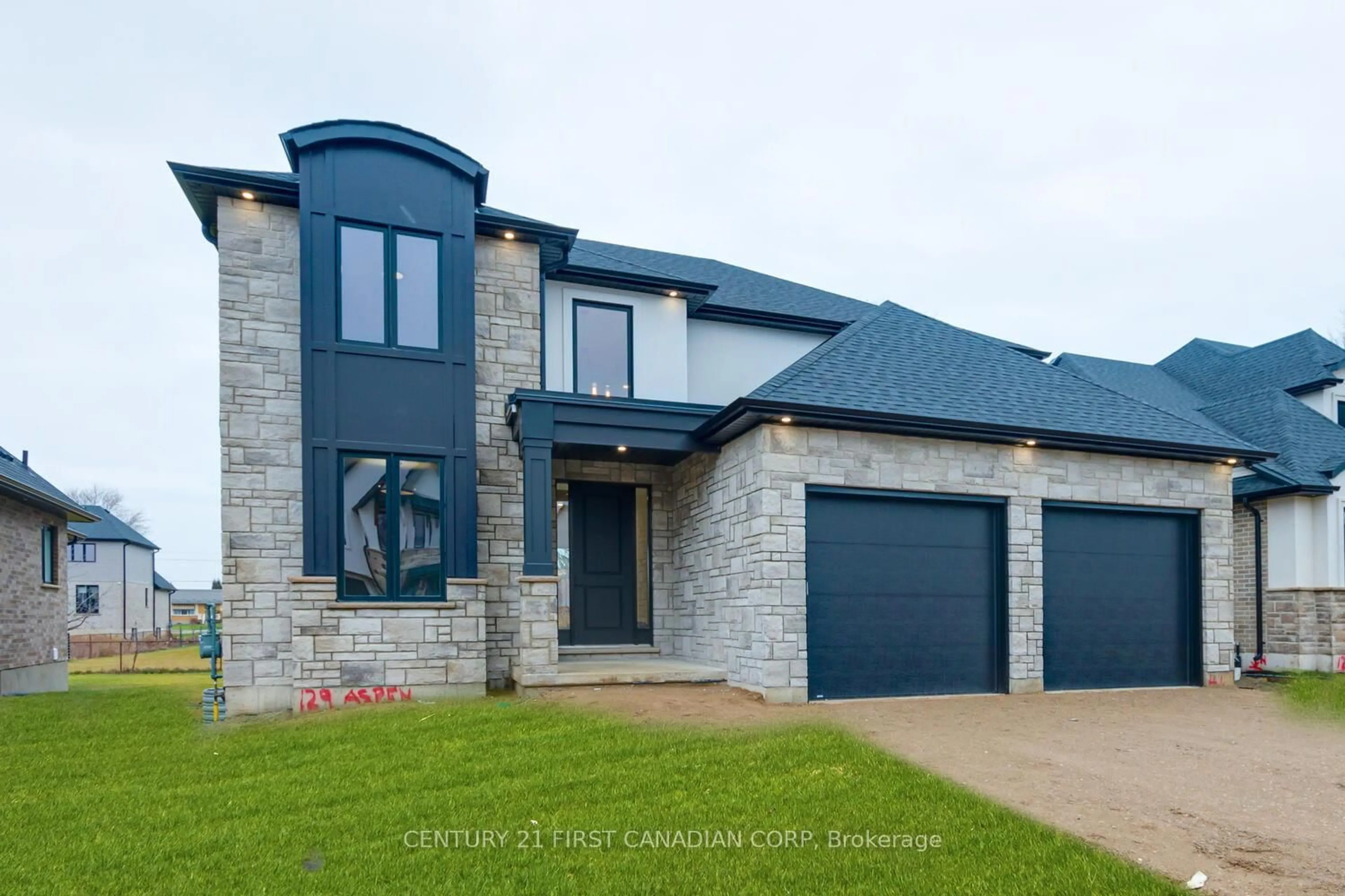 Home with brick exterior material, street for 129 ASPEN Circ, Thames Centre Ontario N0M 2P0