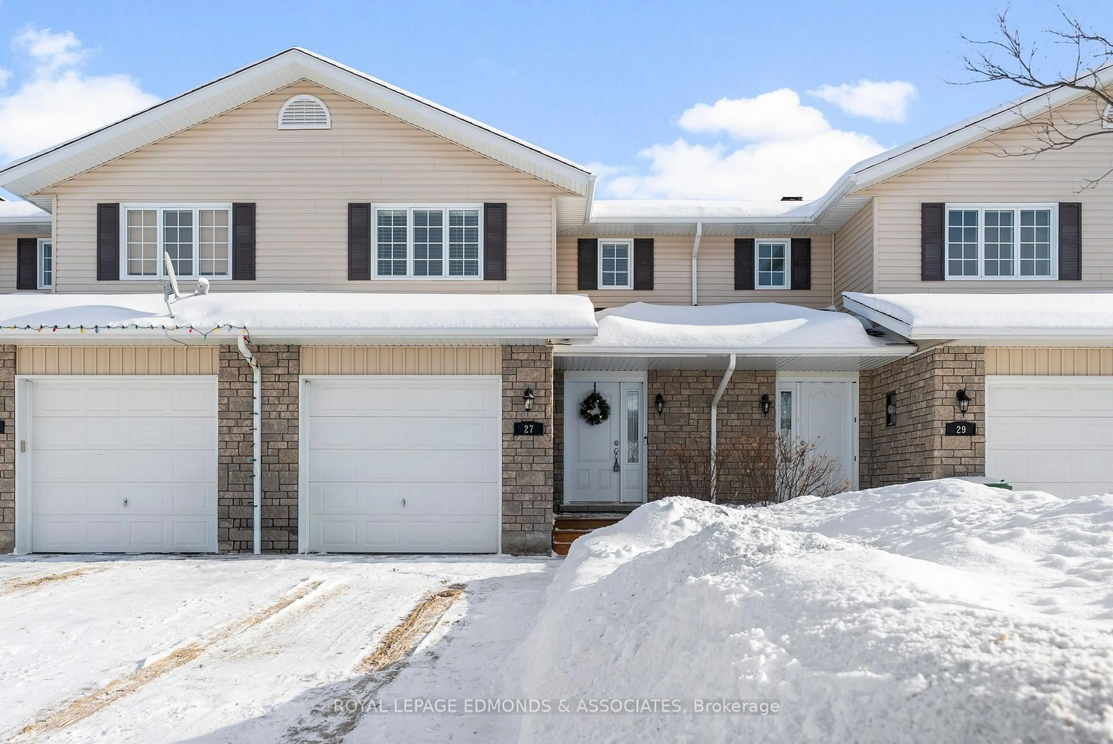 Home with brick exterior material, street for 27 Winston Ave, Petawawa Ontario K8H 0C1