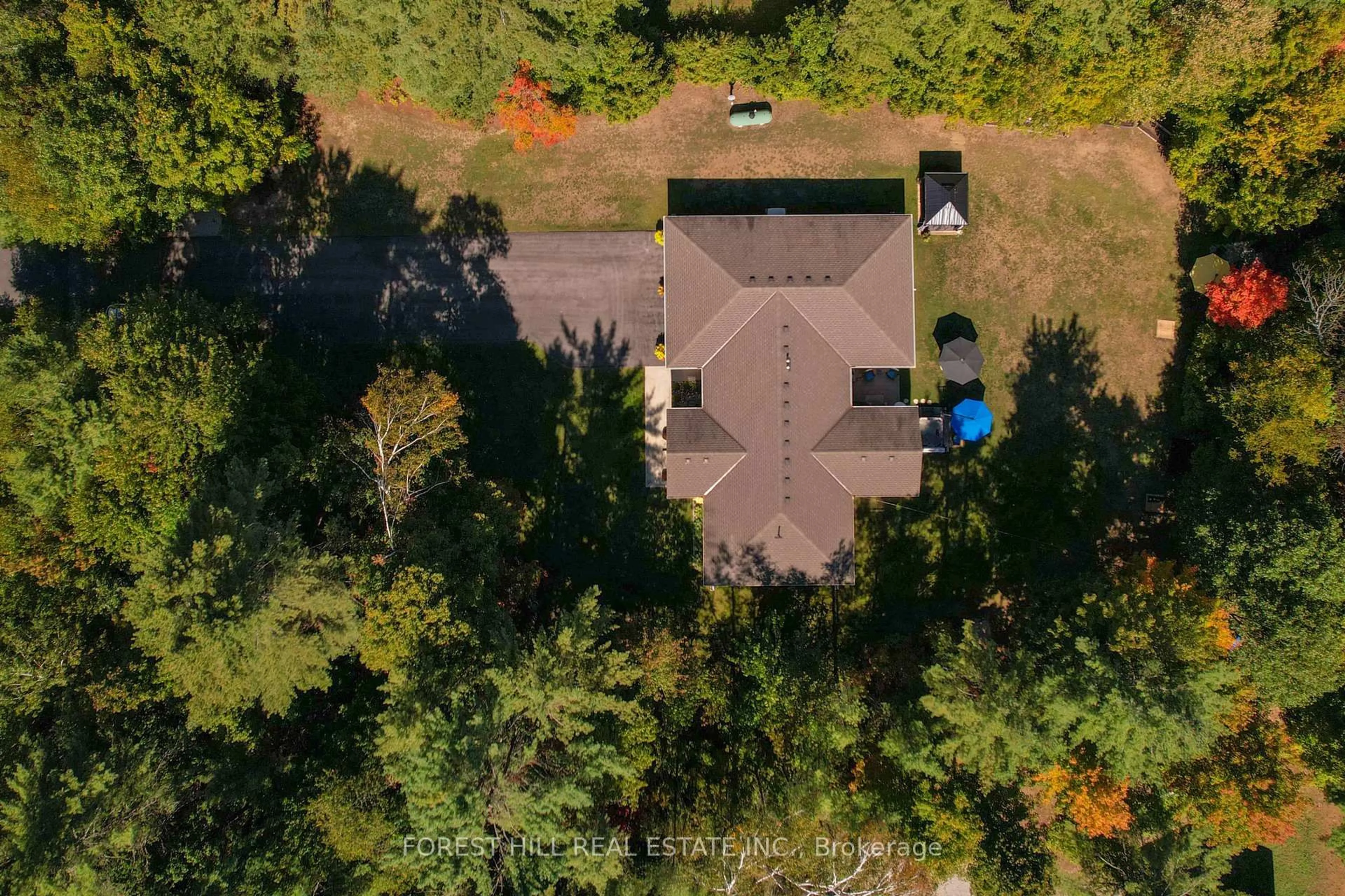 A pic from outside/outdoor area/front of a property/back of a property/a pic from drone, forest/trees view for 1025 TOWER Cres, Gravenhurst Ontario P0E 1G0