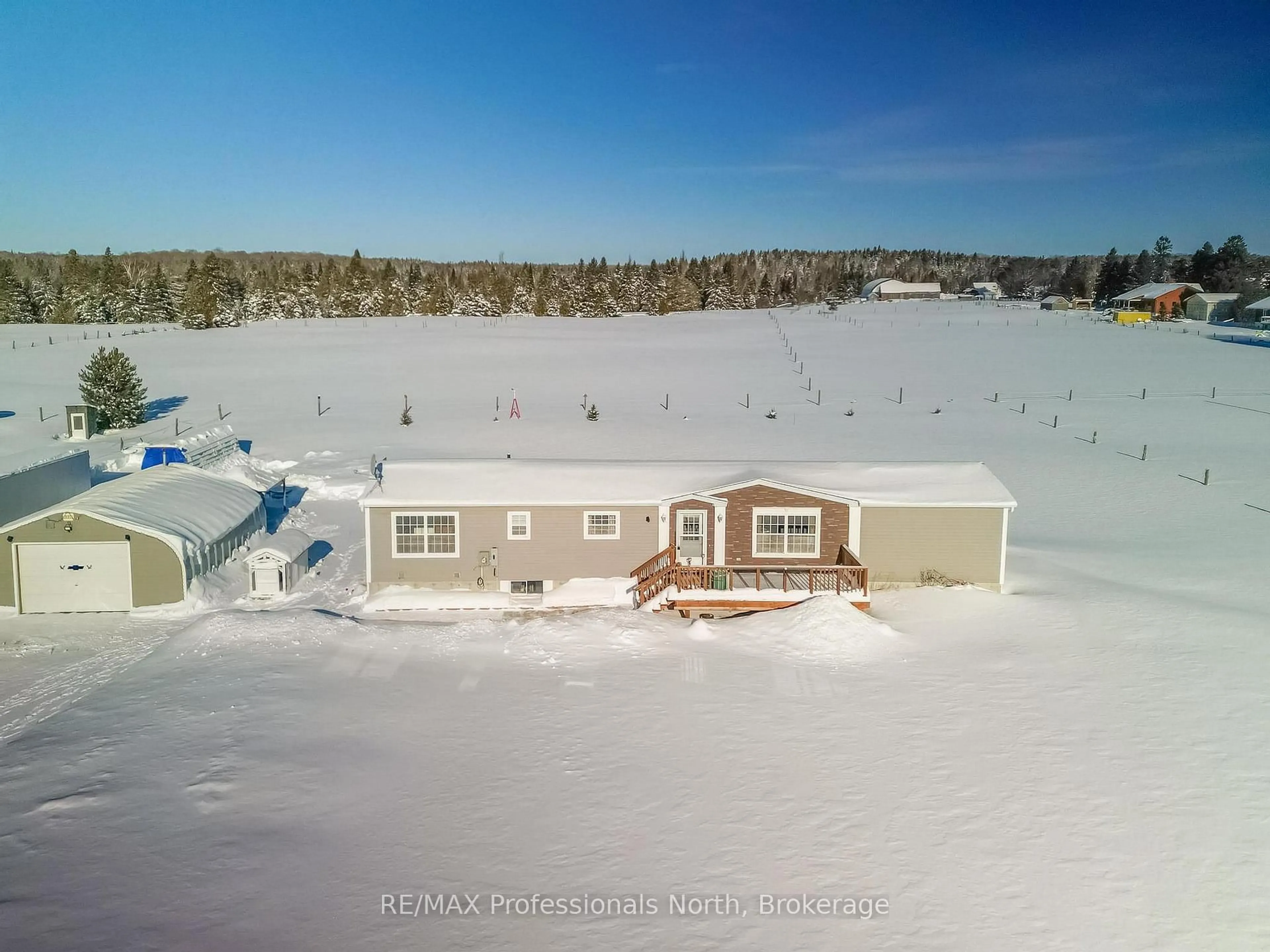 A pic from outside/outdoor area/front of a property/back of a property/a pic from drone, water/lake/river/ocean view for 1200 Ritchie Falls Rd, Minden Hills Ontario K0M 2K0