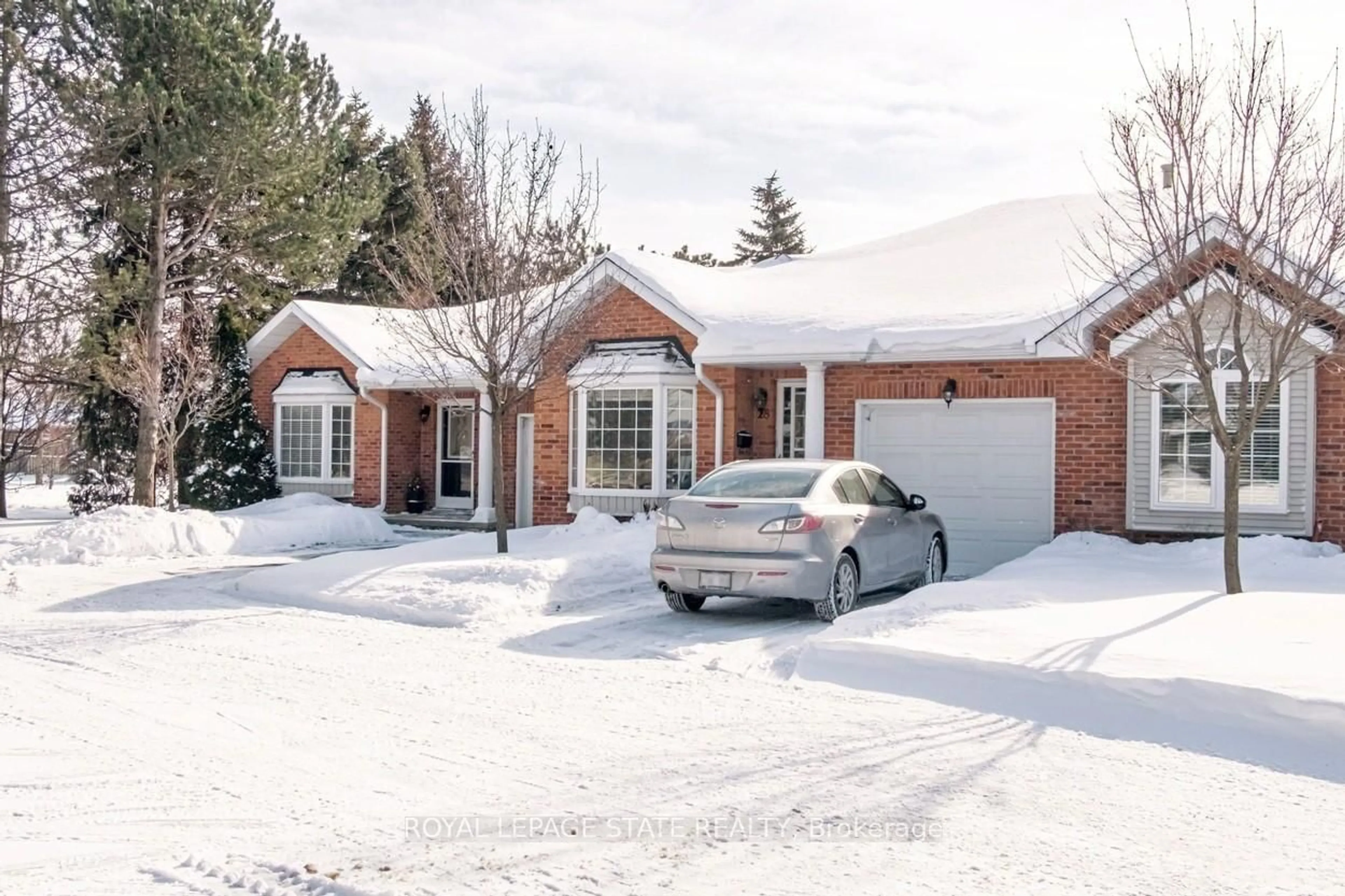 Home with brick exterior material, street for 20 Meadowlands Blvd #28, Hamilton Ontario L9K 1J5