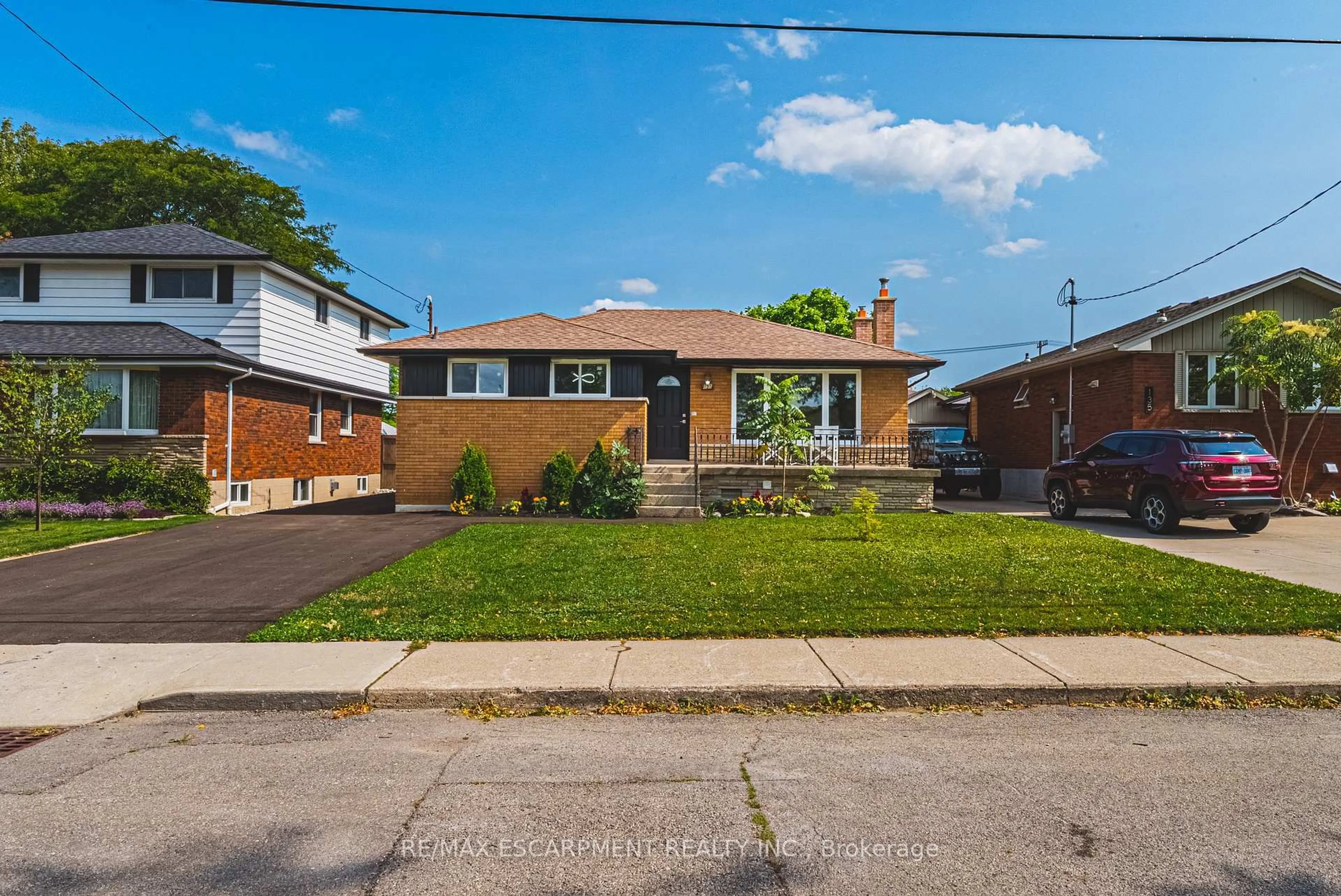 Home with brick exterior material, street for 131 Welbourn Dr, Hamilton Ontario L9A 3N5