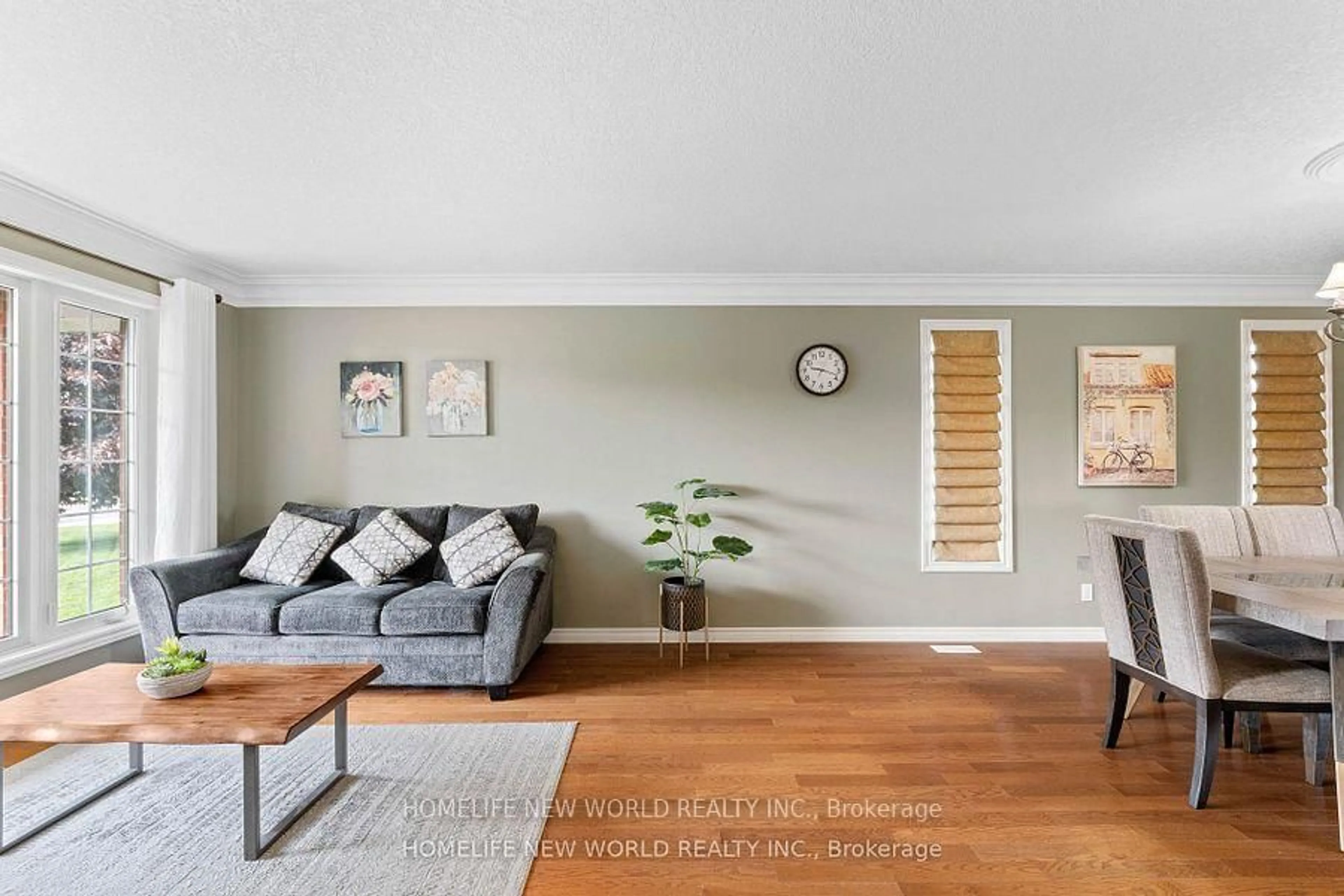 Living room with furniture, wood/laminate floor for 24 Kipling Dr, Belleville Ontario K8N 0C9