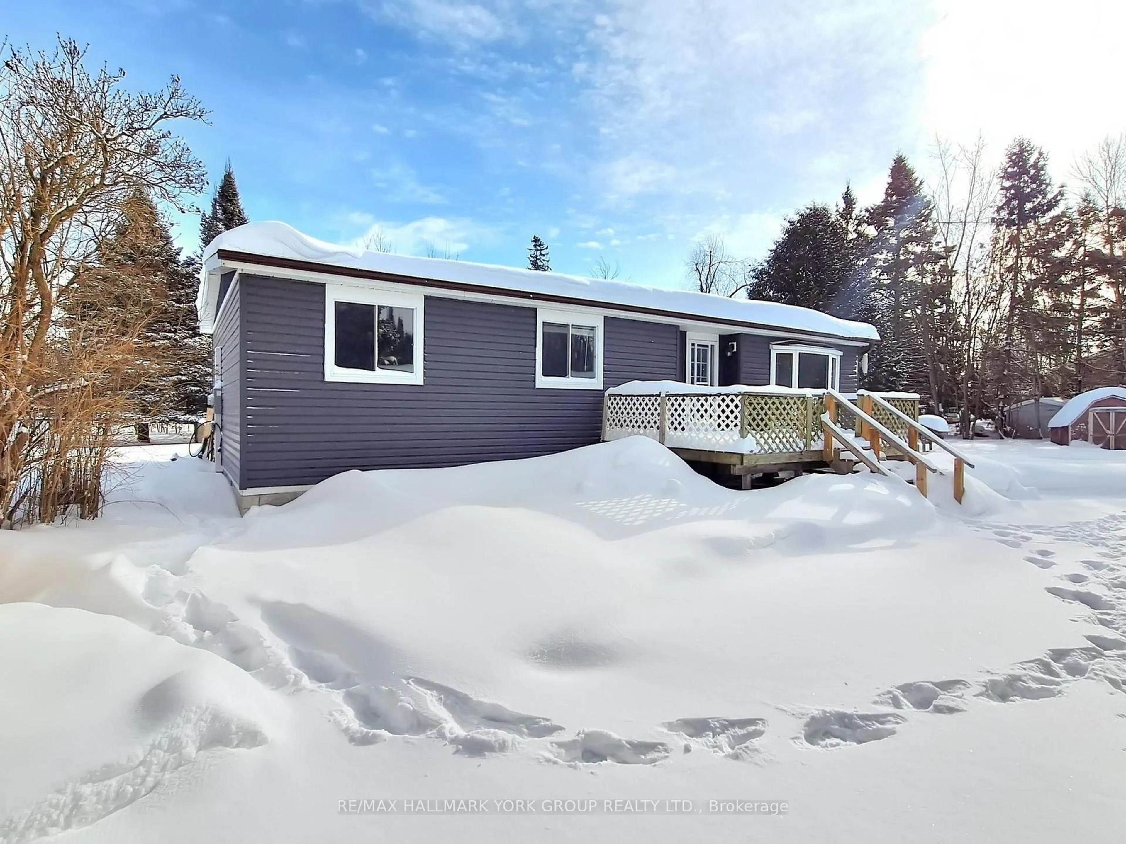 A pic from outside/outdoor area/front of a property/back of a property/a pic from drone, street for 1722 County Road 121, Kawartha Lakes Ontario K0M 1N0