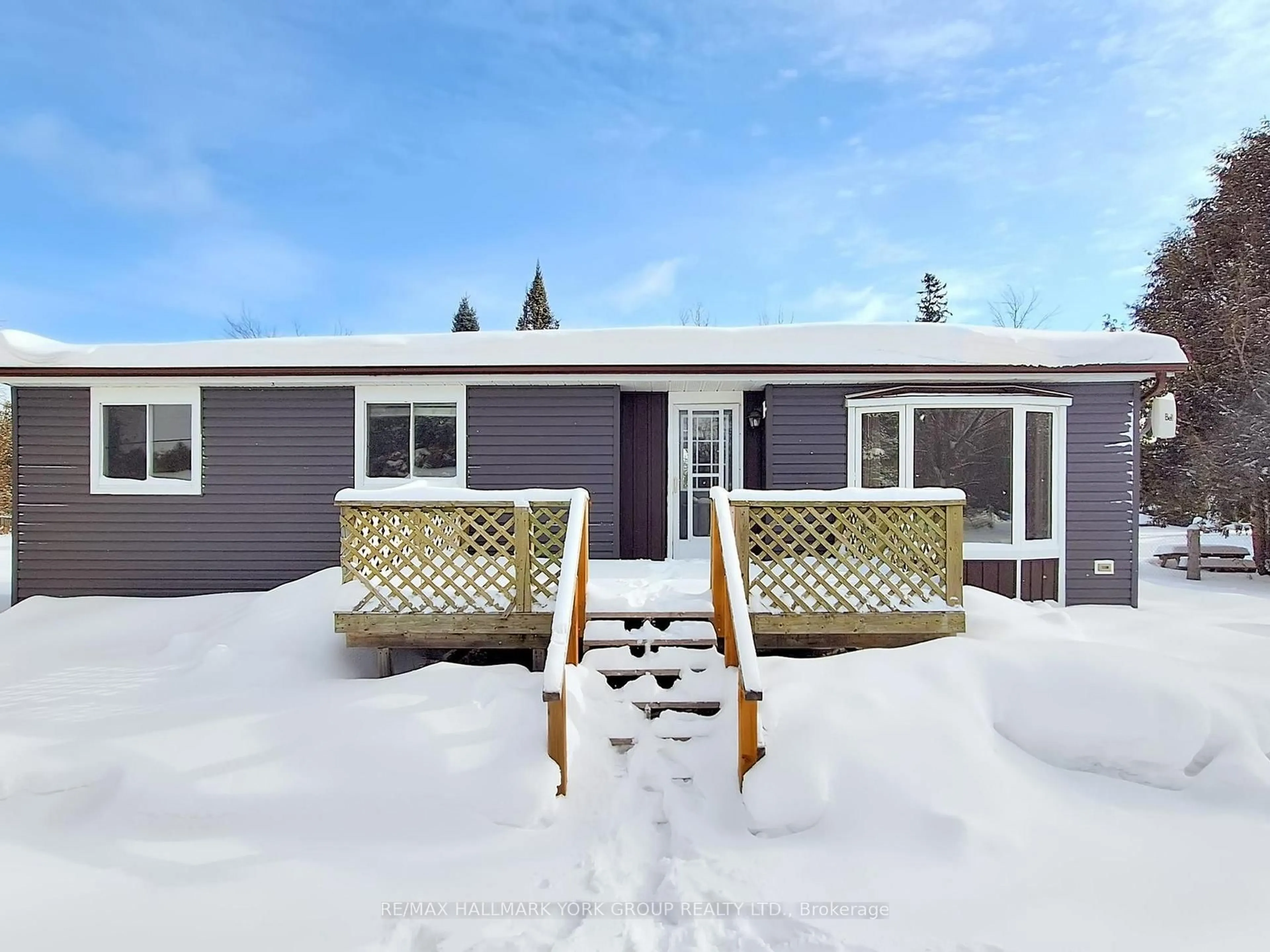 Home with vinyl exterior material, street for 1722 County Road 121, Kawartha Lakes Ontario K0M 1N0