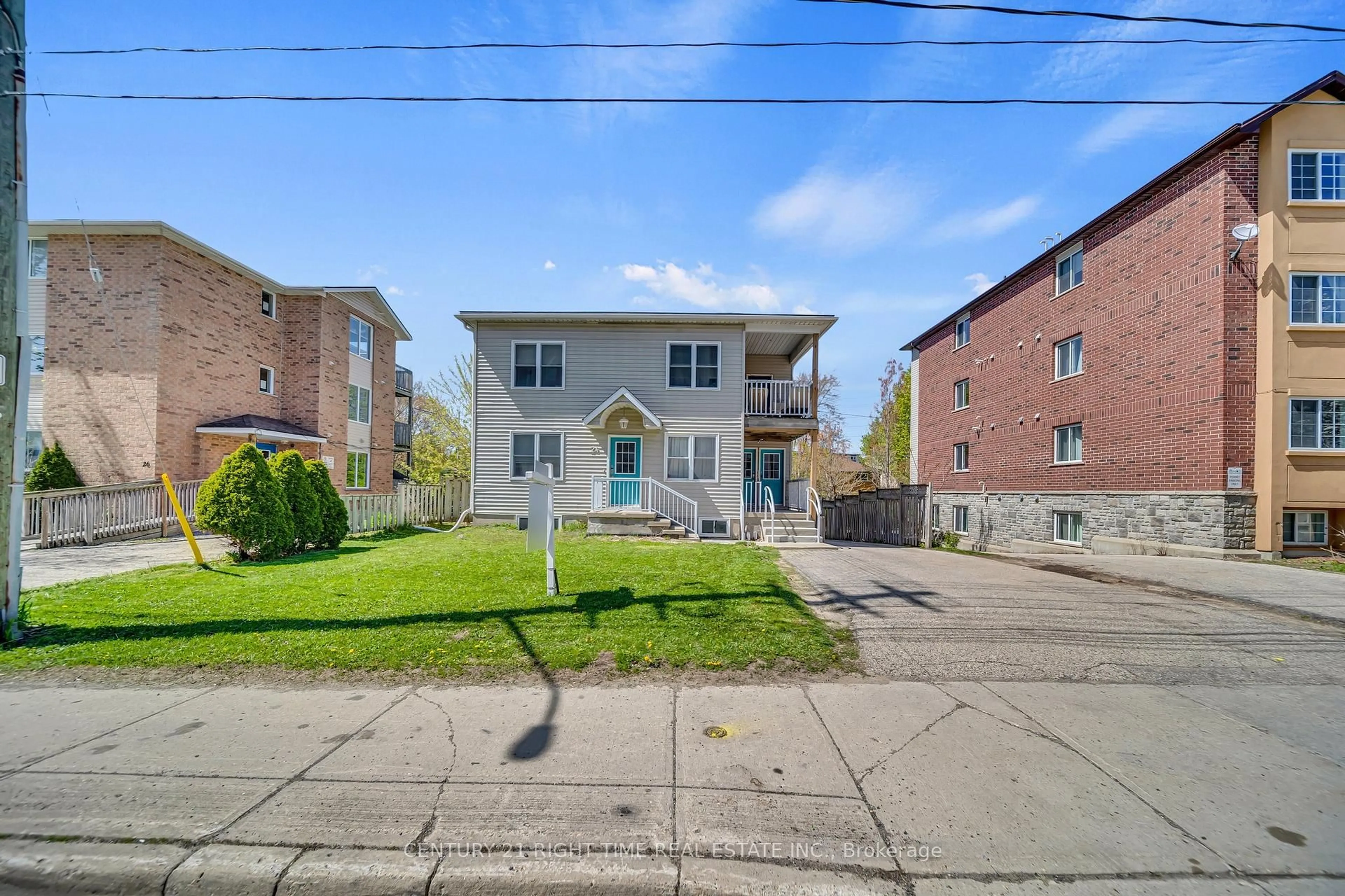 A pic from outside/outdoor area/front of a property/back of a property/a pic from drone, street for 24 columbia St, Kitchener Ontario N2L 3K3