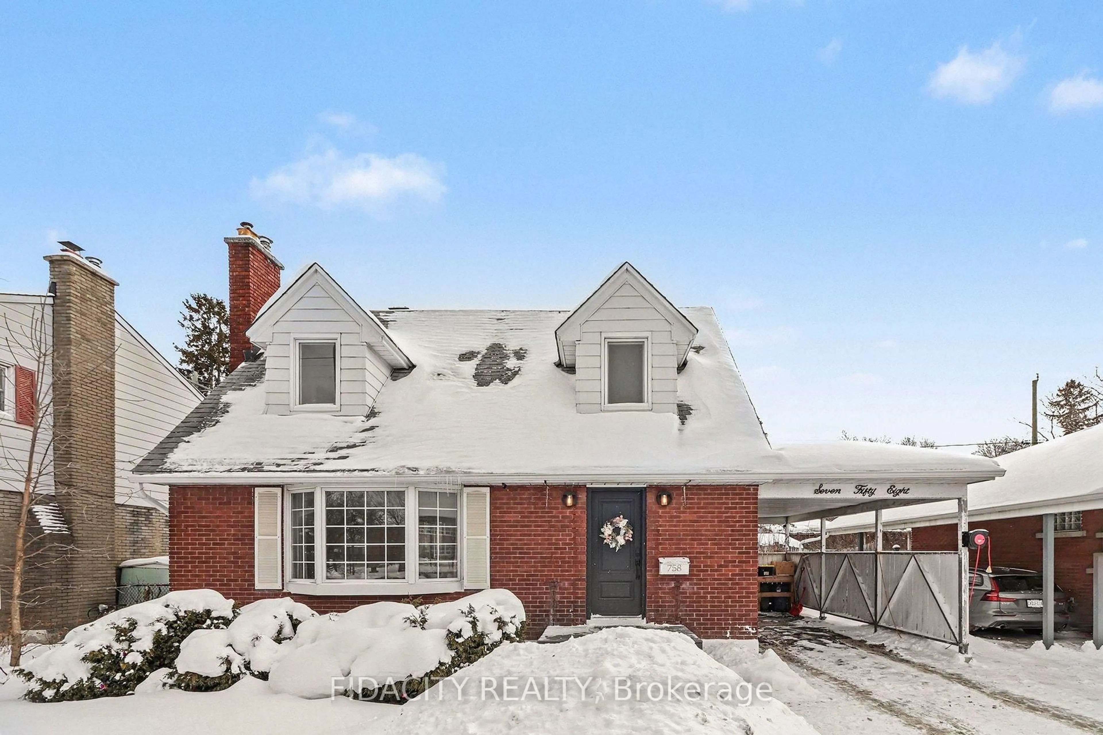 Home with brick exterior material, street for 758 Smyth Rd, Ottawa Ontario K1G 1P1