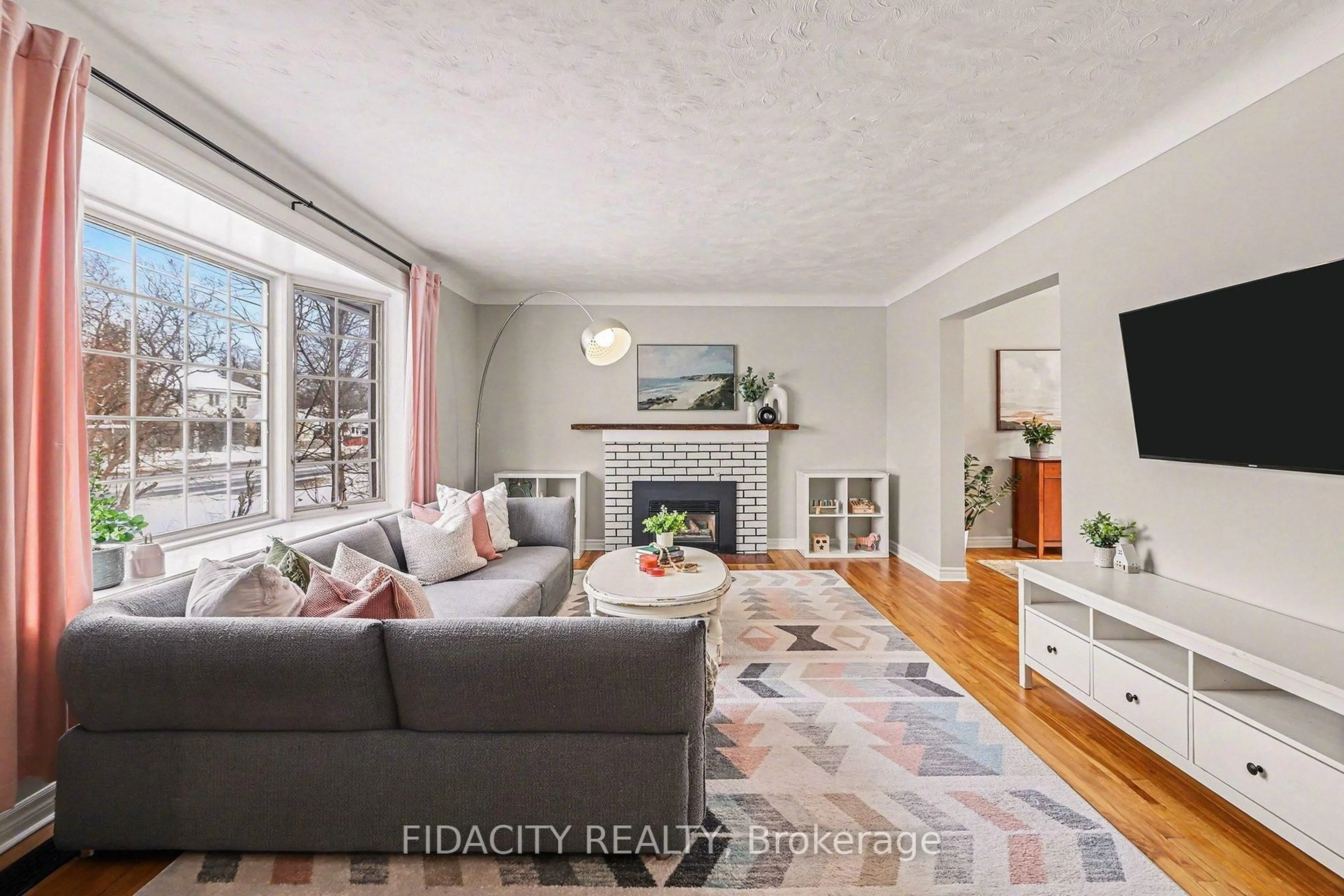 Living room with furniture, unknown for 758 Smyth Rd, Ottawa Ontario K1G 1P1