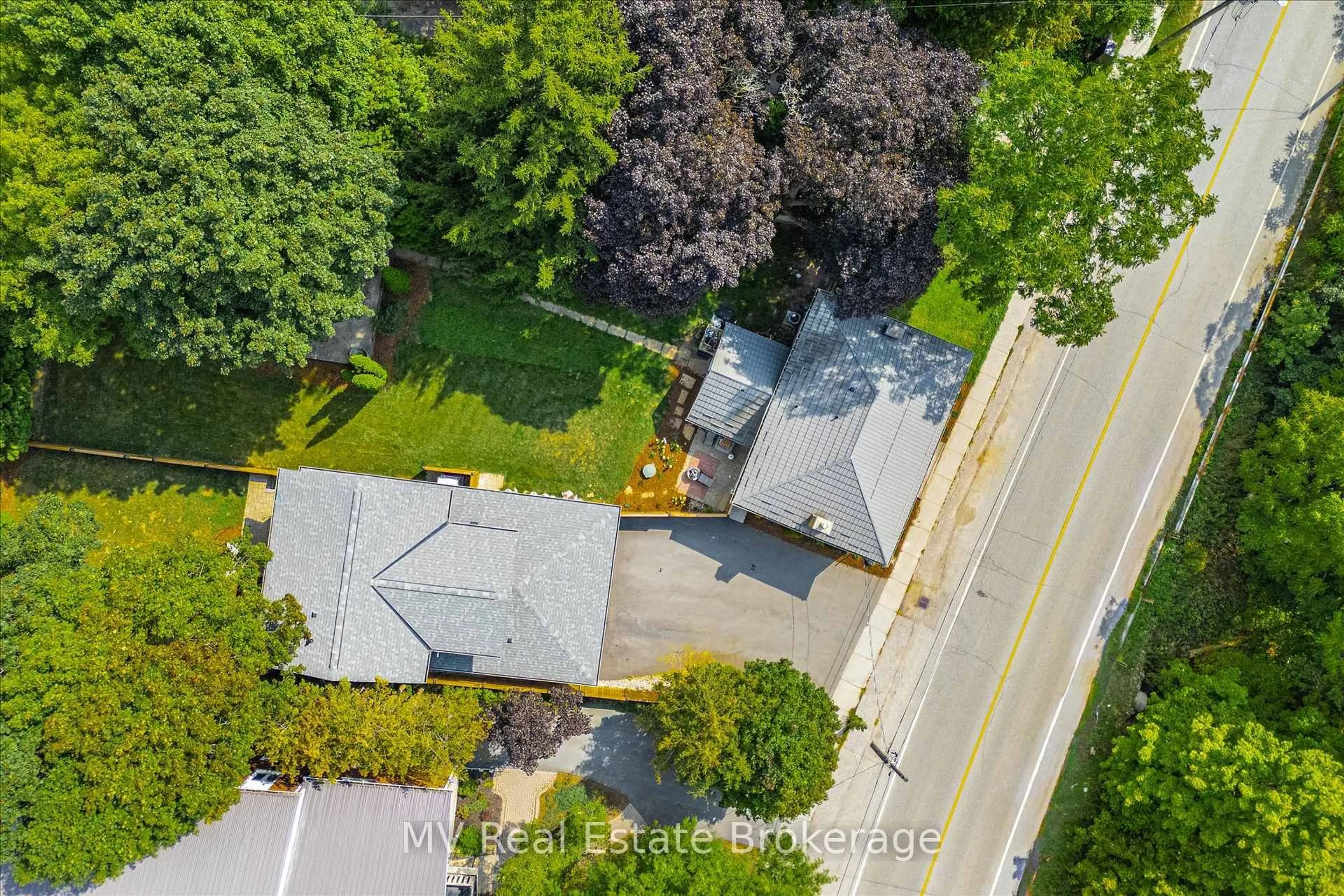 A pic from outside/outdoor area/front of a property/back of a property/a pic from drone, street for 377 Geddes St, Centre Wellington Ontario N0B 1S0